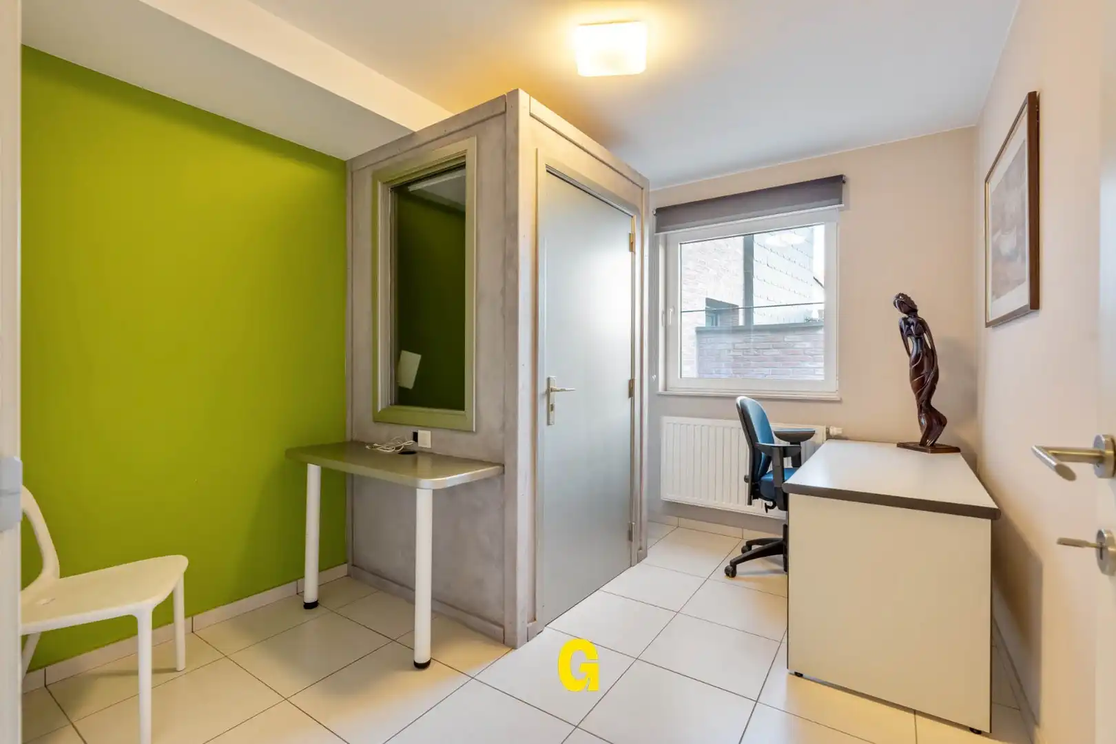 Netjes verzorgd en comfortabel ingericht gelijkvloers appartement met ruim terras, standplaats en kelderberging op wandelafstand van de markt foto 15