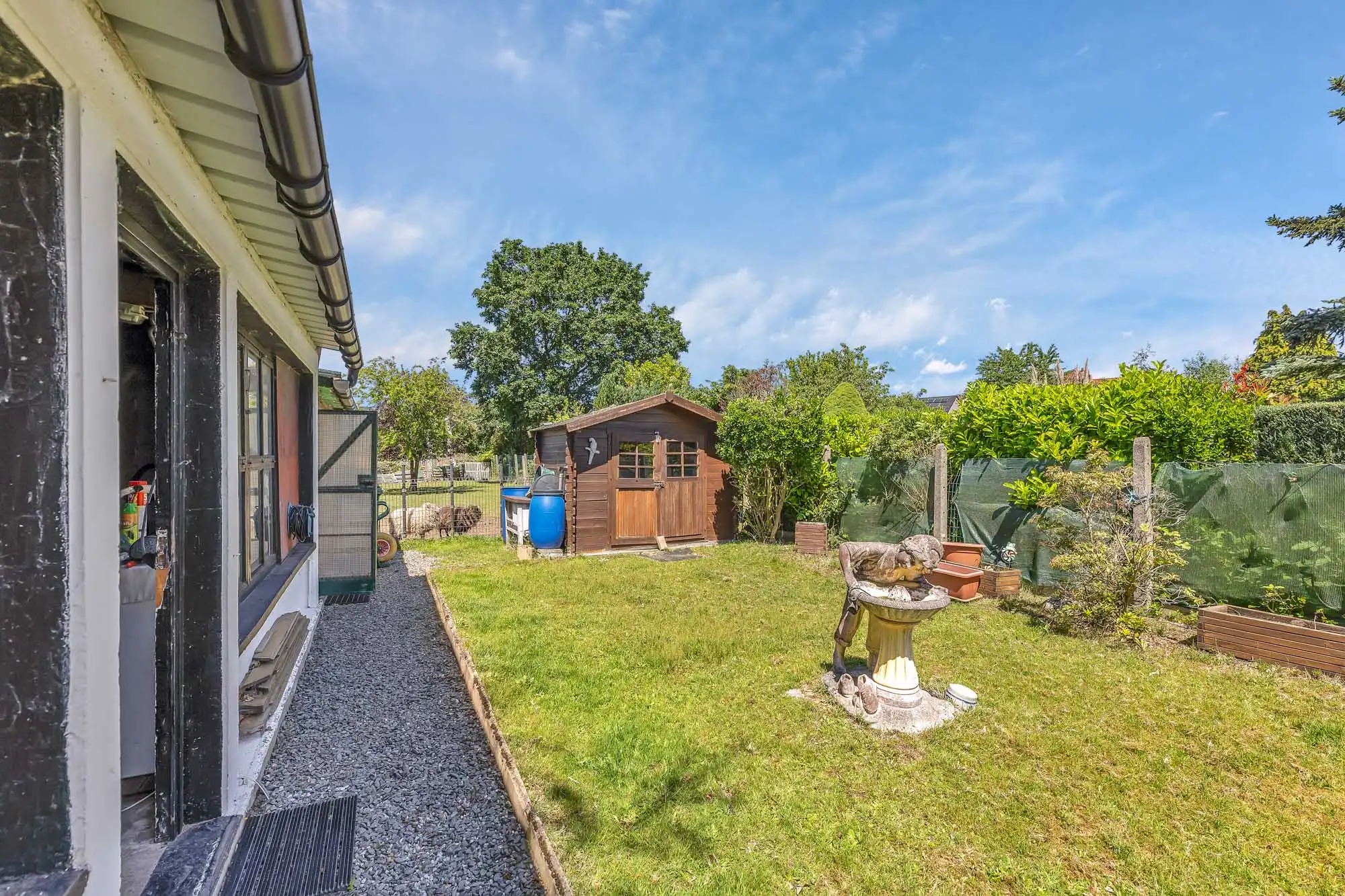 Instapklare woning met 3 slpks, ruime tuin en garage foto 23