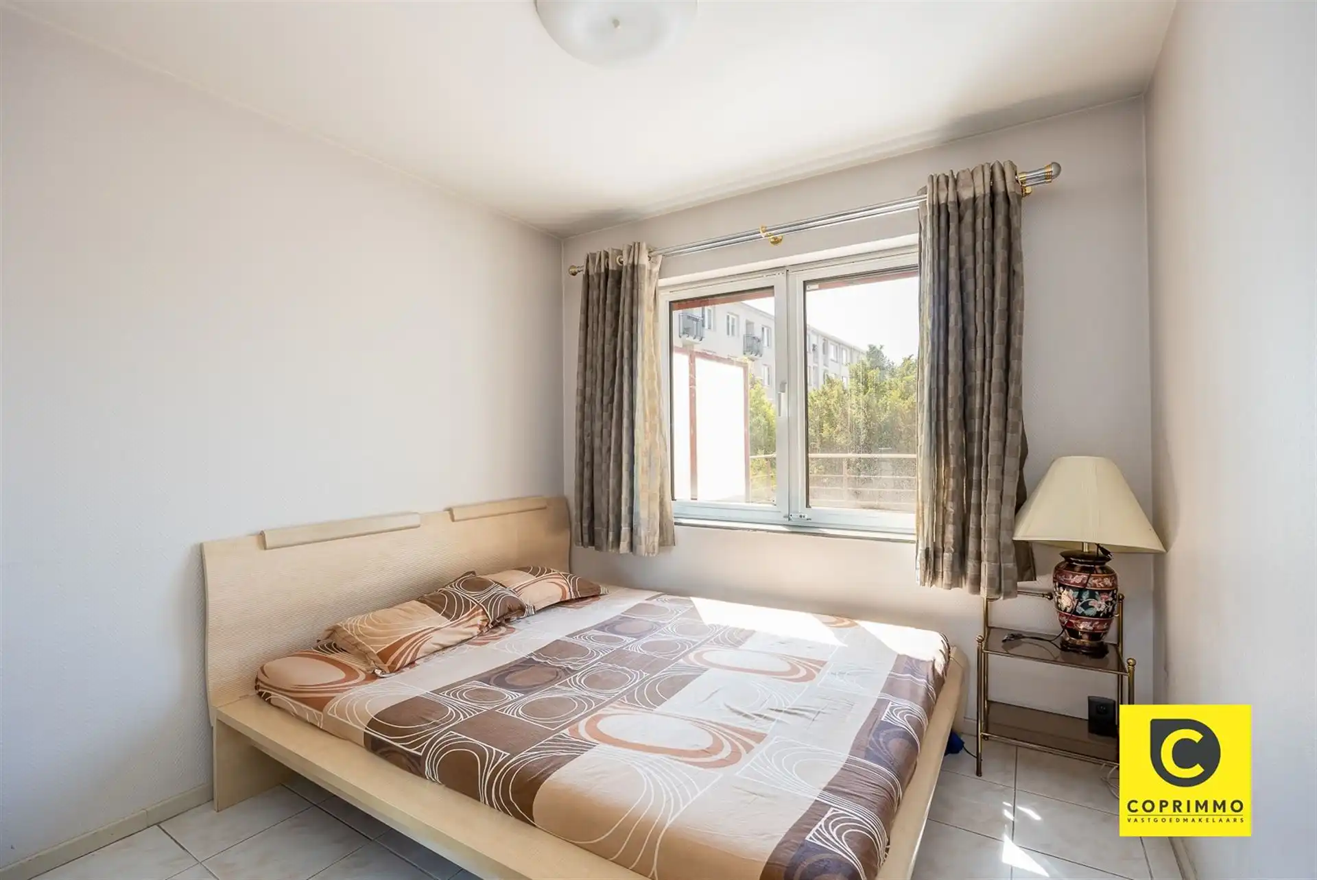 Riante woning met Z-tuin in de Oosterveldwijk ! foto 14