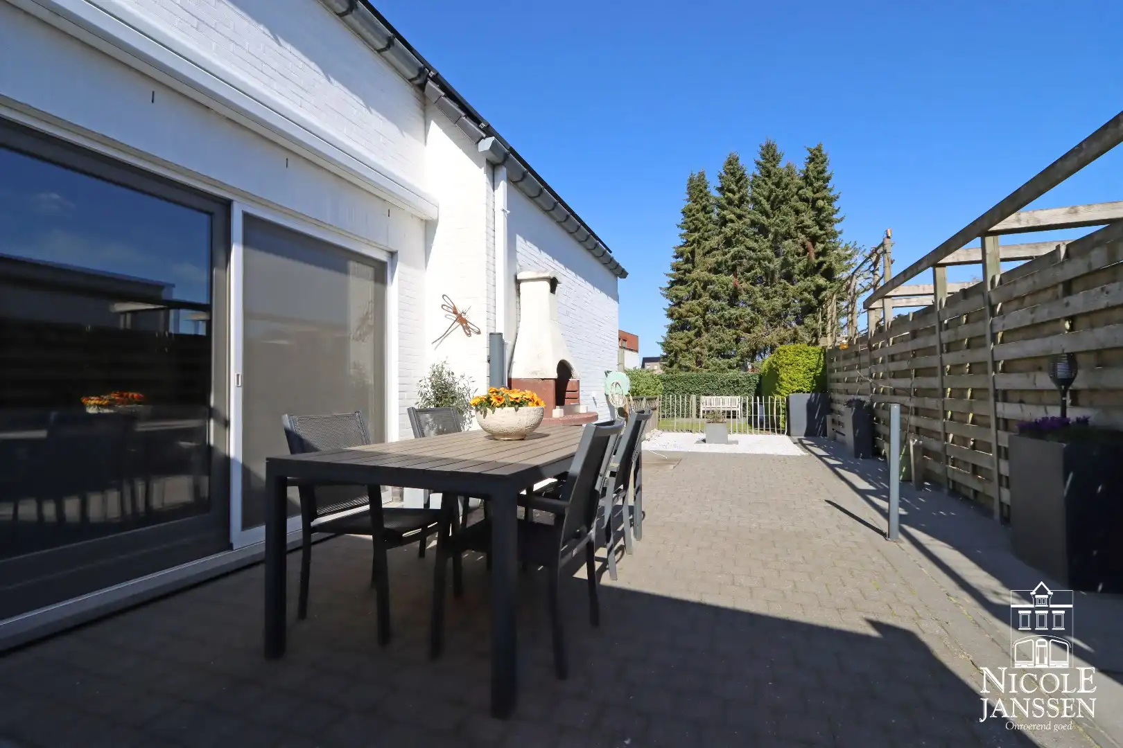 Instapklare woning met ruimte voor praktijk en mooie ingesloten tuin in Bree centrum foto 34