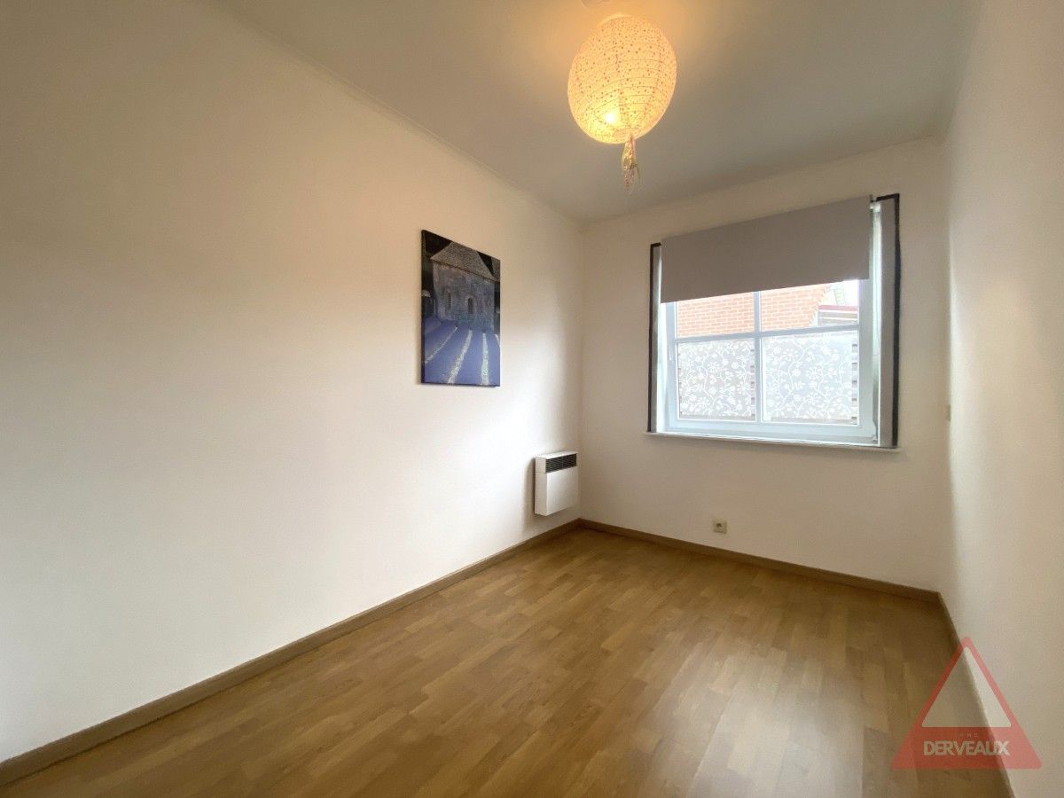 Passendale – Gelijkvloerse woning met ruime tuin en carport foto 12