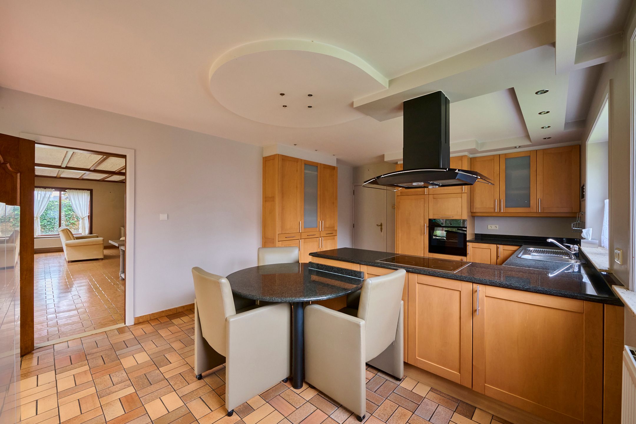 Zeer ruime gezinswoning + bovenliggend appartement foto 5