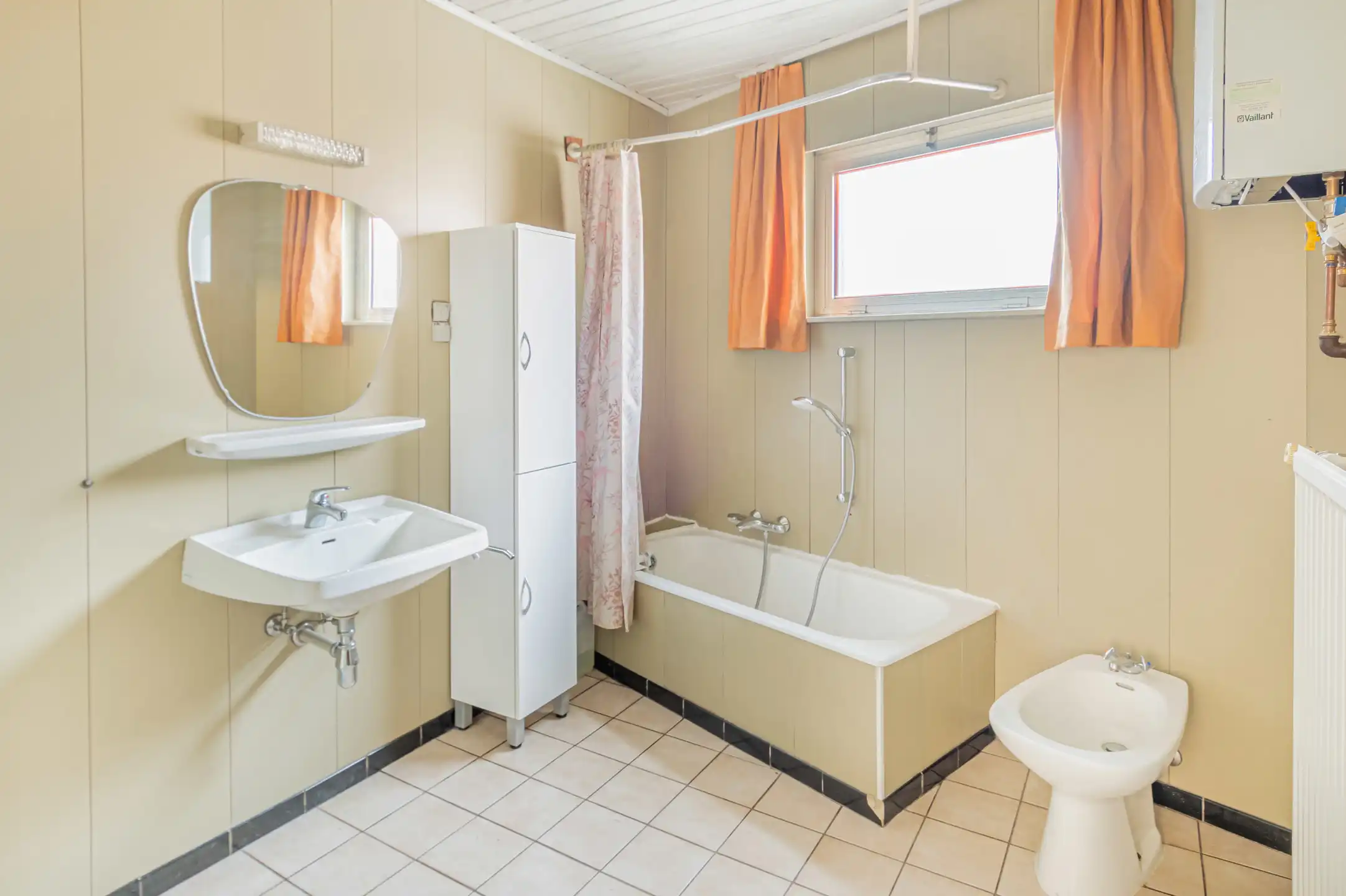 Te renoveren gezinswoning met garage in hartje Willebroek foto 8