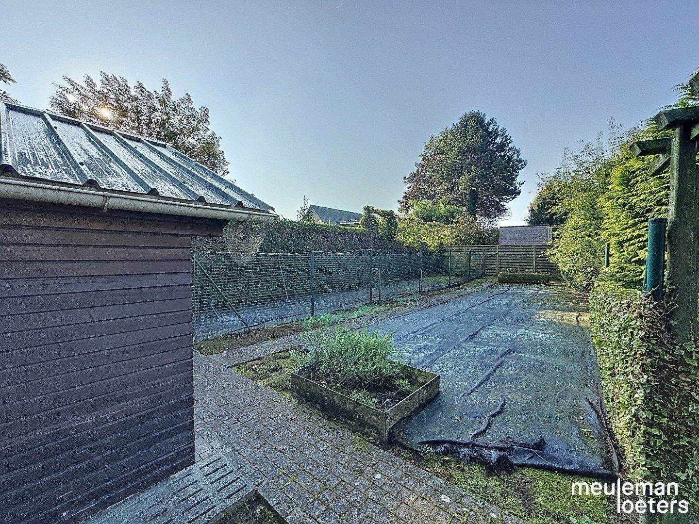 Ruime vrijstaande woning met magnifieke tuin in centrum foto 28