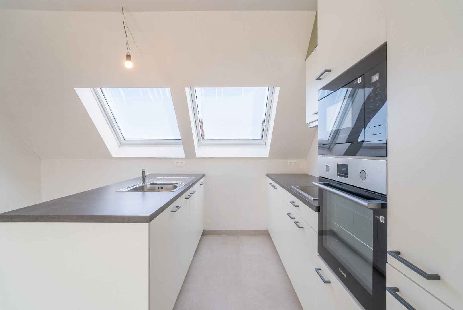 Gezellig nieuw dakappartement met 1 slaapkamer en terras op de tweede verdieping, in Residentie Escautval. foto 5