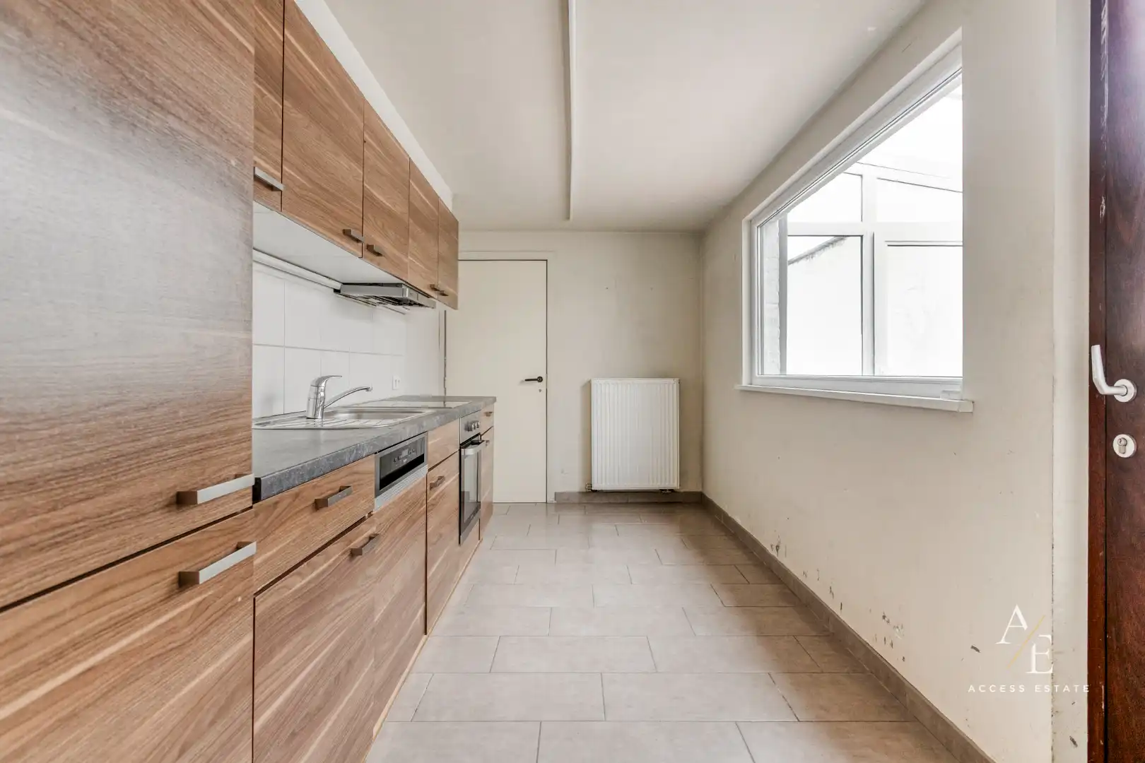 CENTRAAL GELEGEN WONING MET 3 (+2) SLAAPKAMERS EN AFGESLOTEN TUIN IN WEVELGEM foto 5