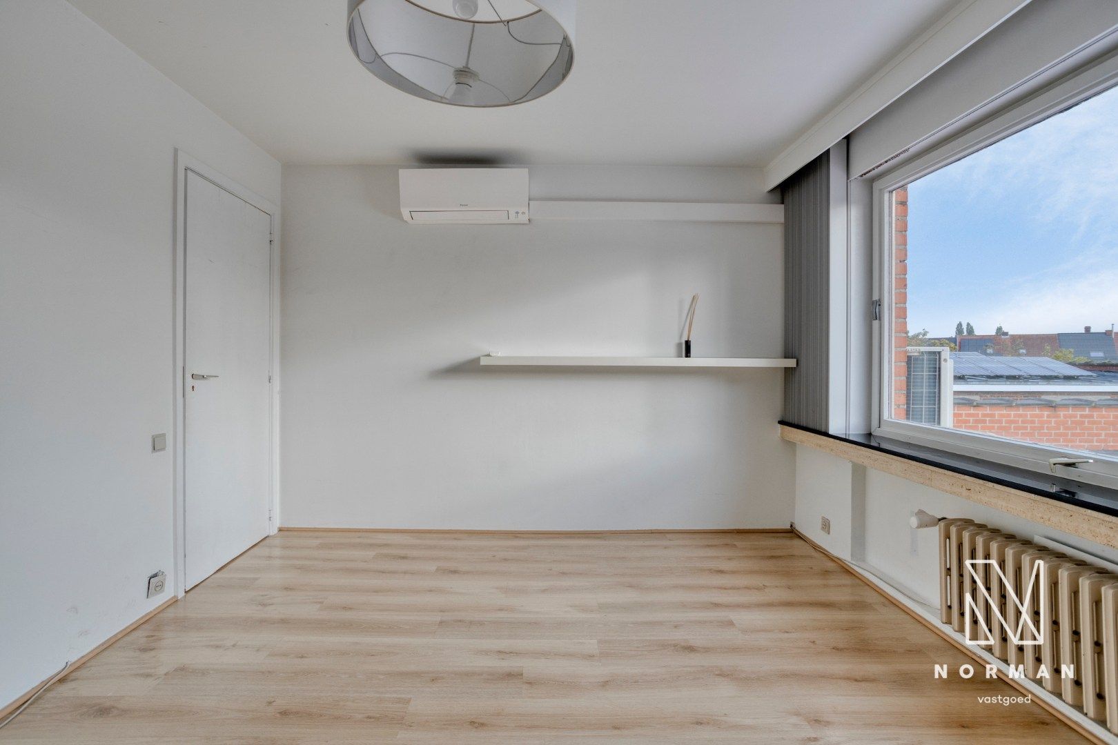 Duplex te koop in het centrum van Kuurne met 3 slaapkamers en een groot zongericht terras met tuinhuis.  foto 21