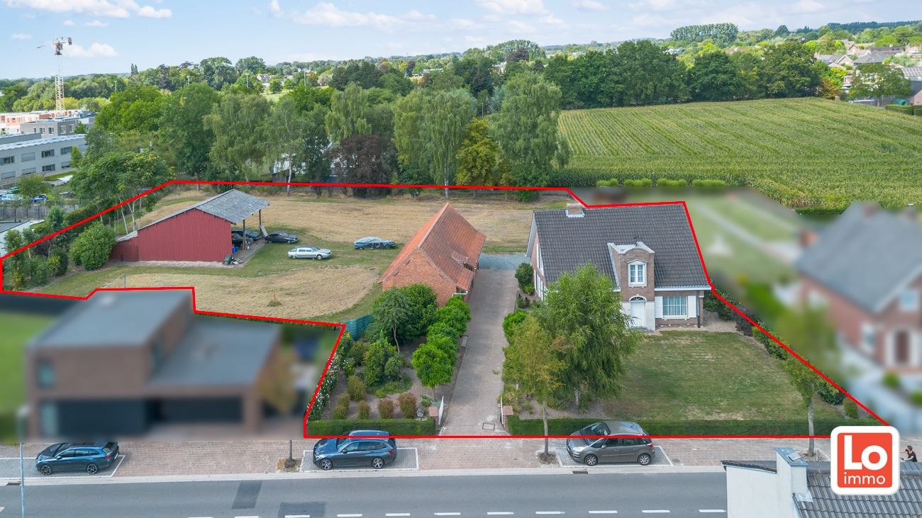 Statige open woning met ruim bijgebouw op groot perceel grond in het centrum van Kalken! foto 2