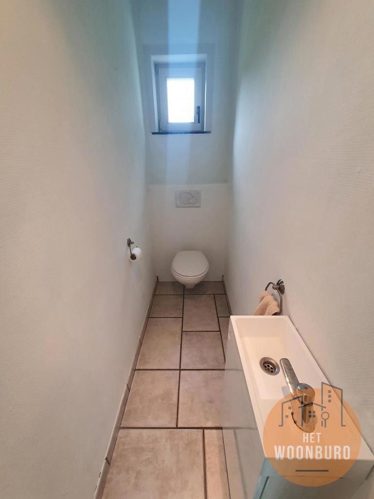 Woning open bebouwing met garage en tuin foto 4