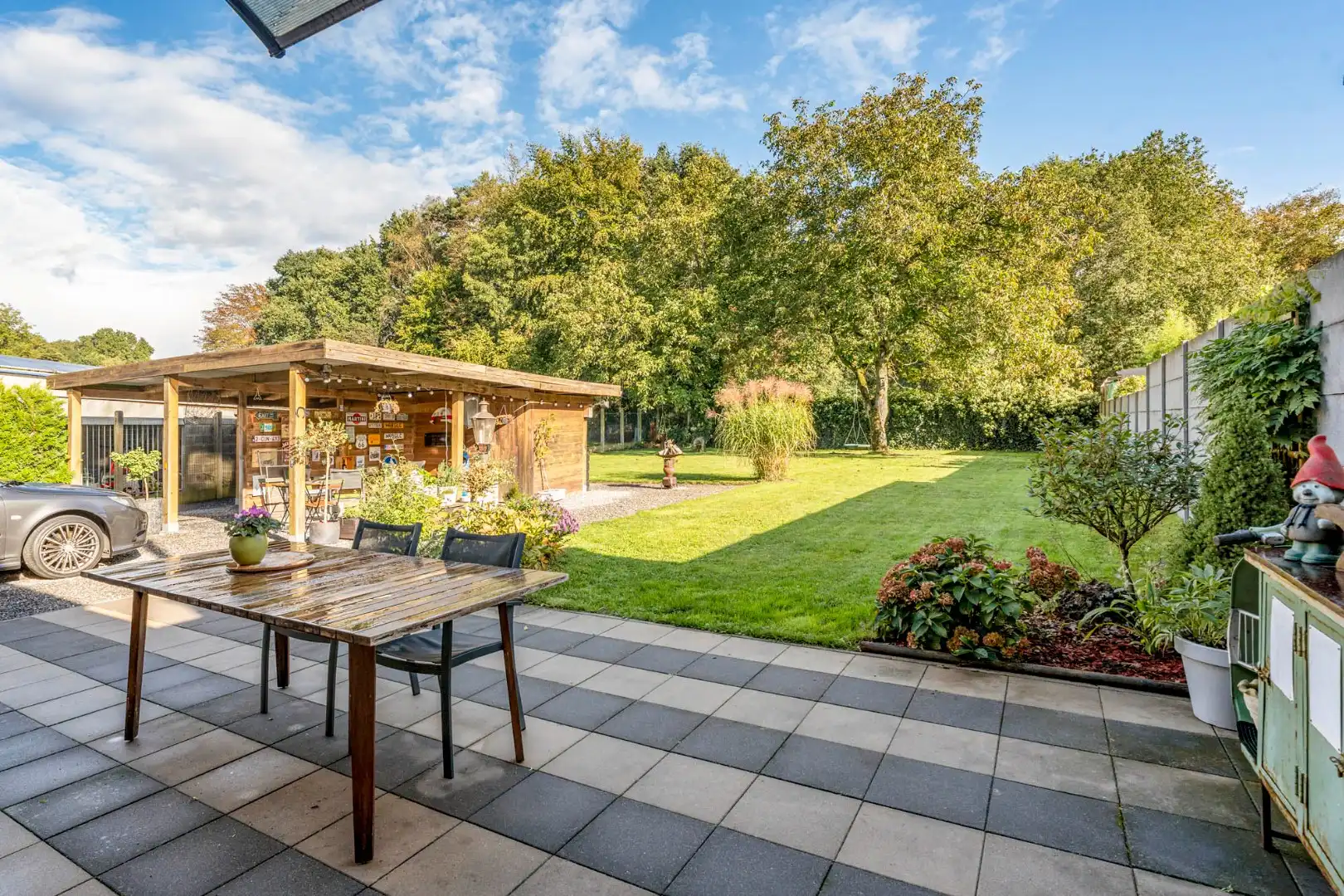 Comfortabel, gelijkvloers appartement mét ruime tuin en carport! foto 12