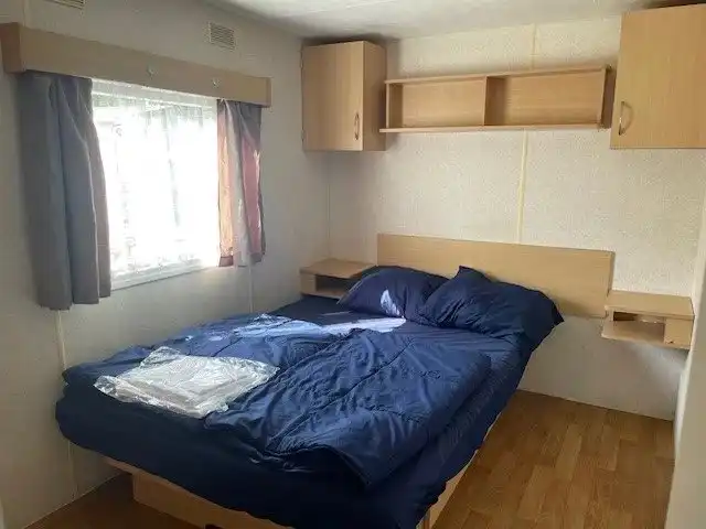 Stacaravan te Zilverstrand voor 8 personen met tuinhuis en terras. foto 11