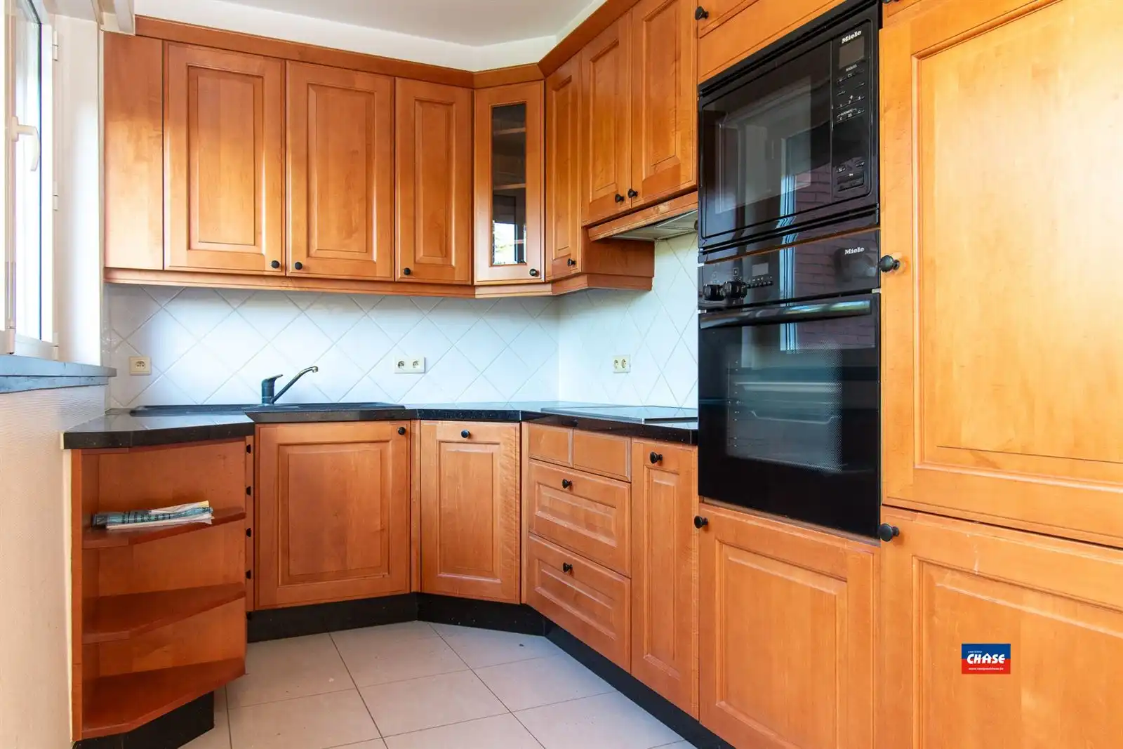 Woning met 2-3 slpks, tuin en garage foto 8