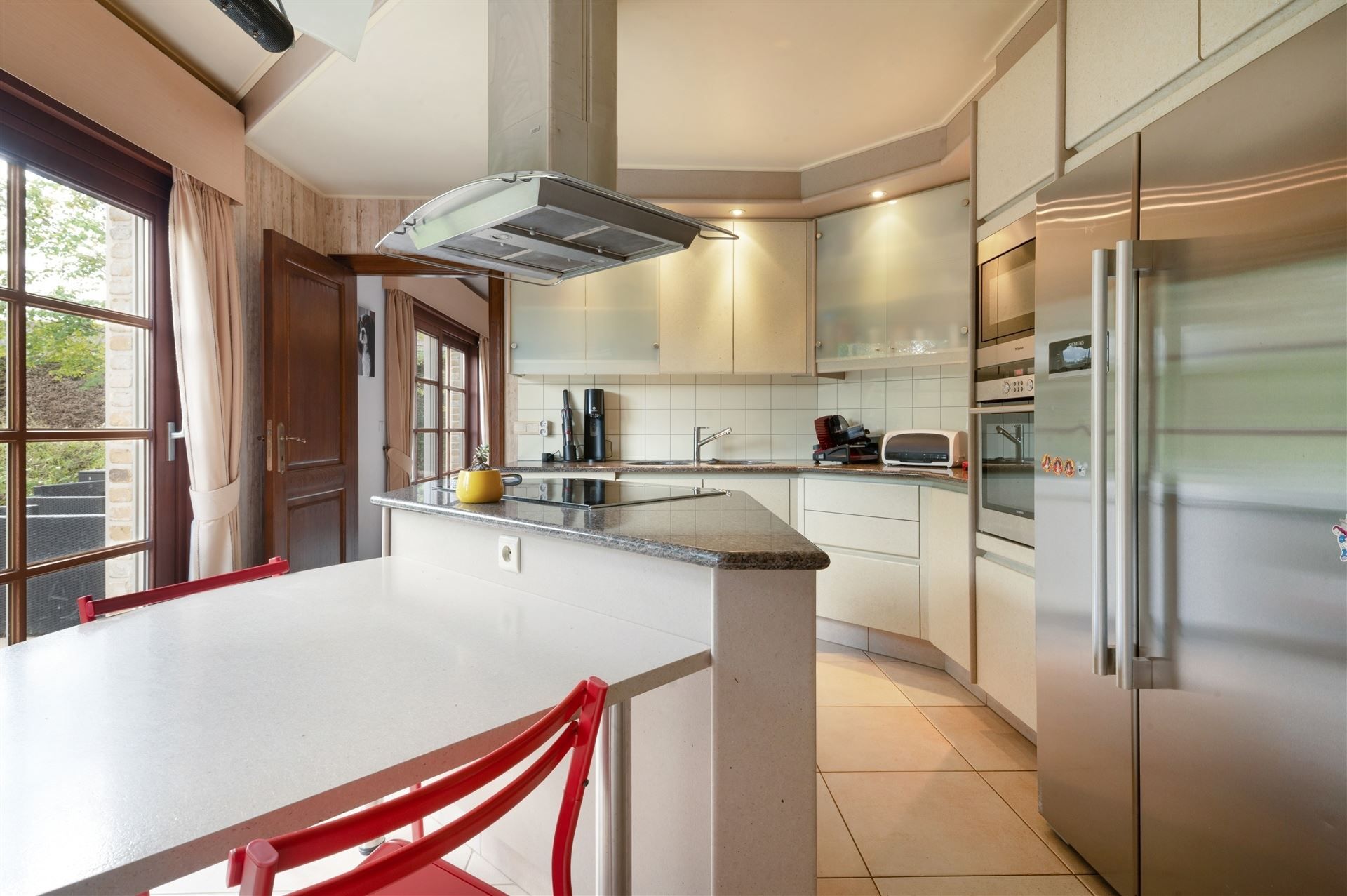 Exclusieve villa met tuin & zonneterras, omgeven door groen foto 8