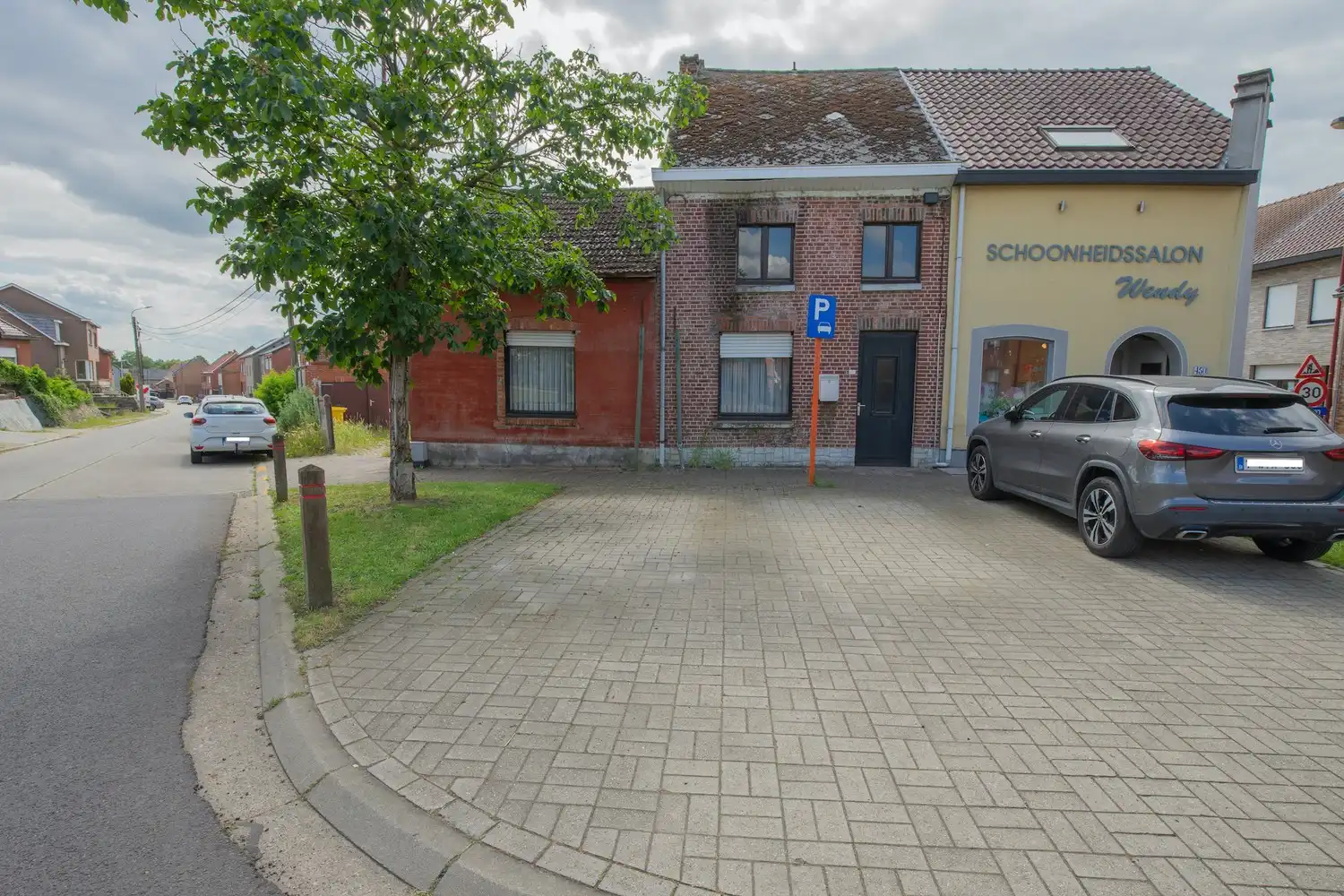 Te renoveren halfopen bebouwing met garage op een perceel van 321 m² te Scherpenheuvel foto 2