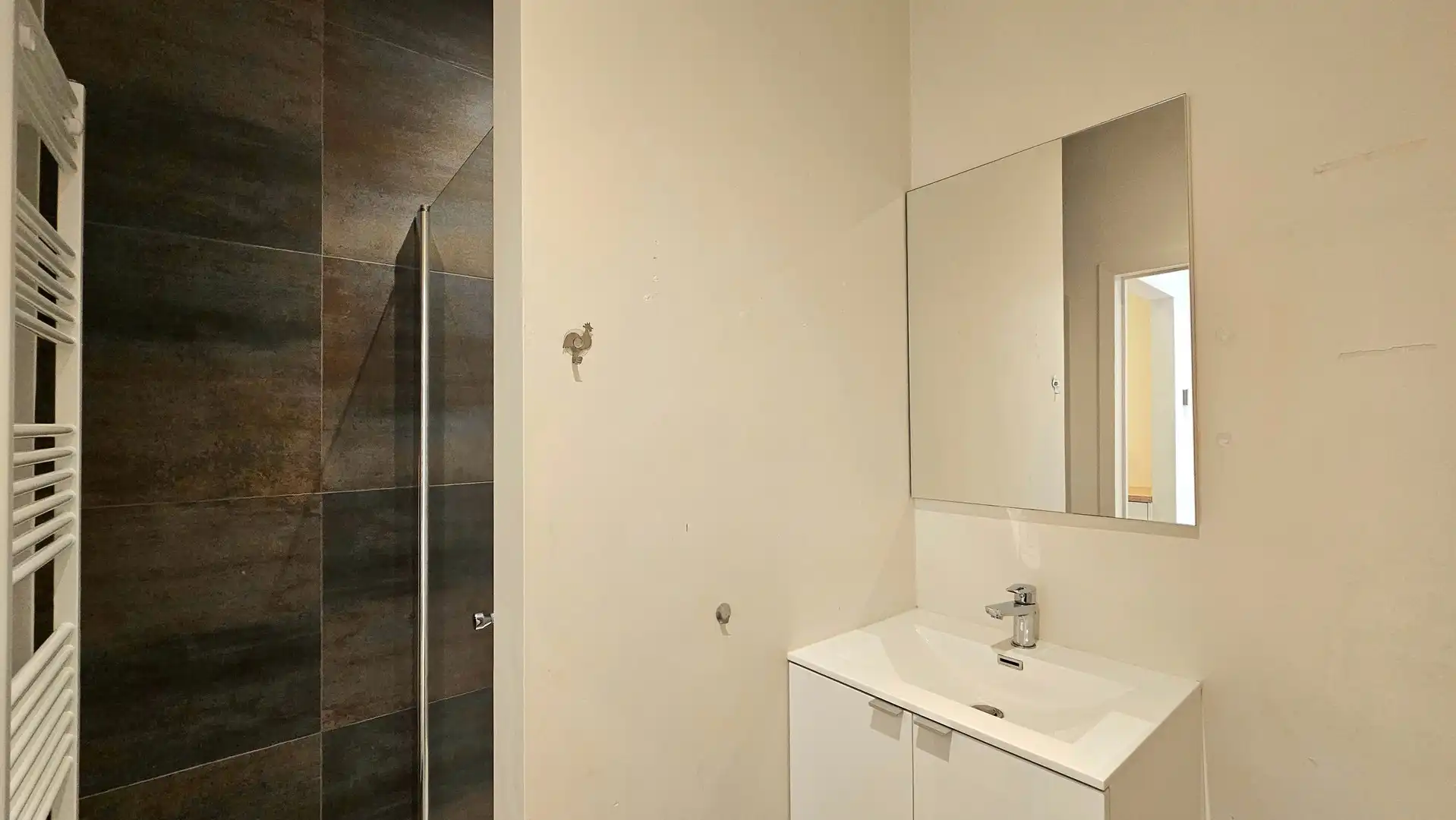 Appartement op het gelijkvloers met koer foto 4