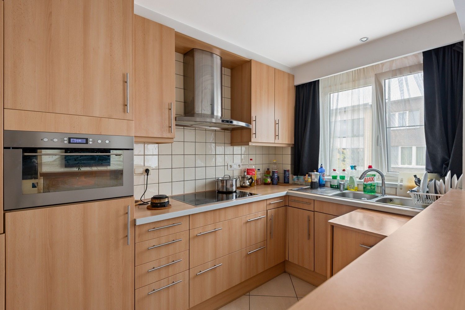 Opbrengsteigendom met 2 appartementen, tuin en garage te koop in Deurne! foto 6