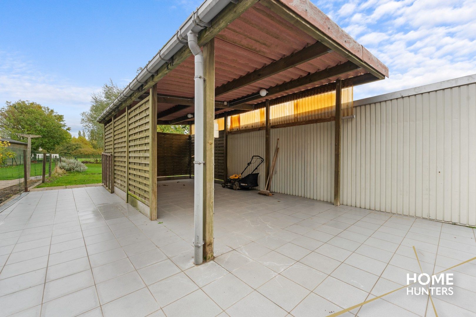 Halfopen gezinswoning met 3 slpks, carport en diepe tuin in Dikkebus foto 11