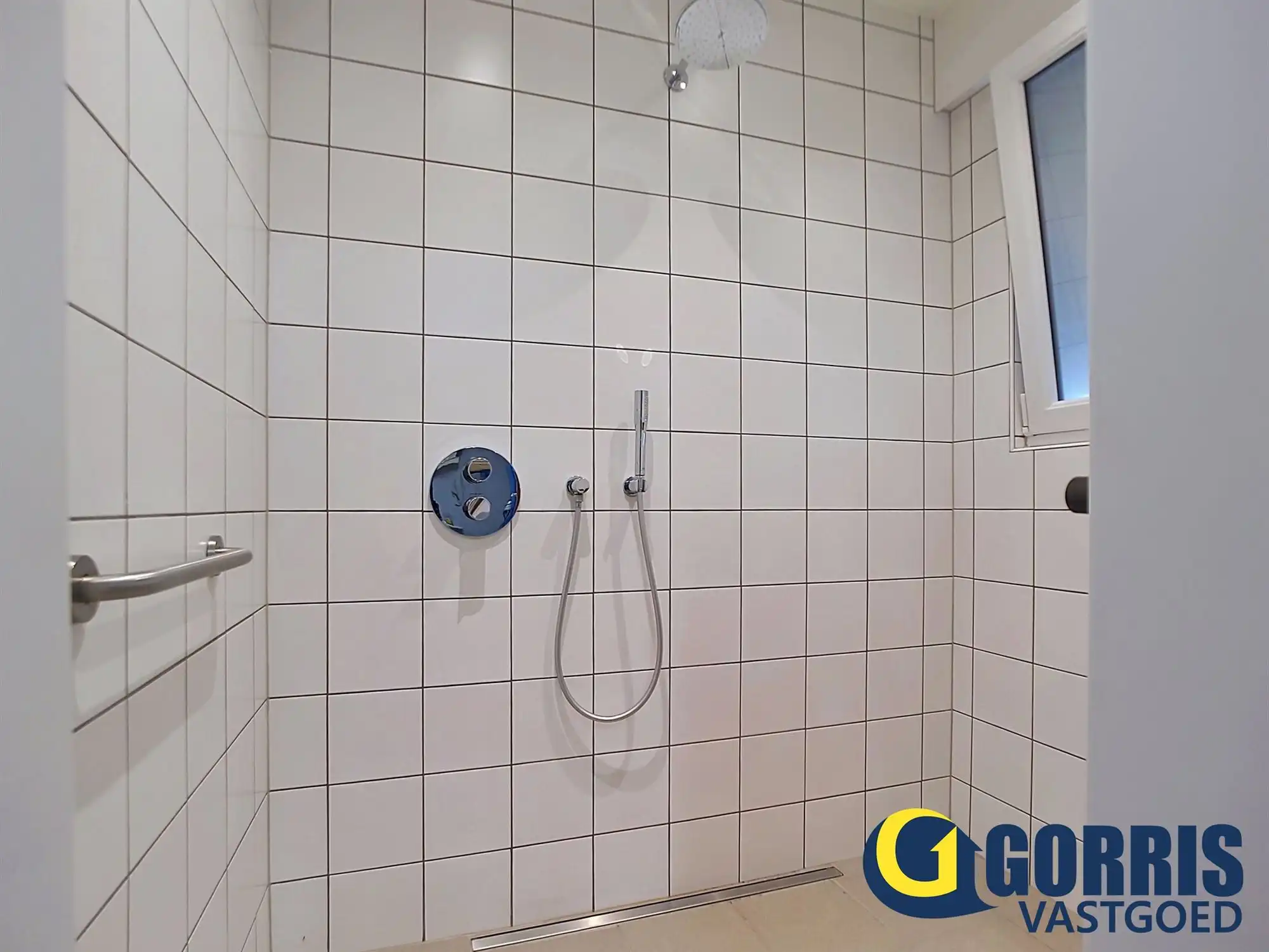 Te renoveren woning met ruime tuin in het centrum van Hulshout foto 7