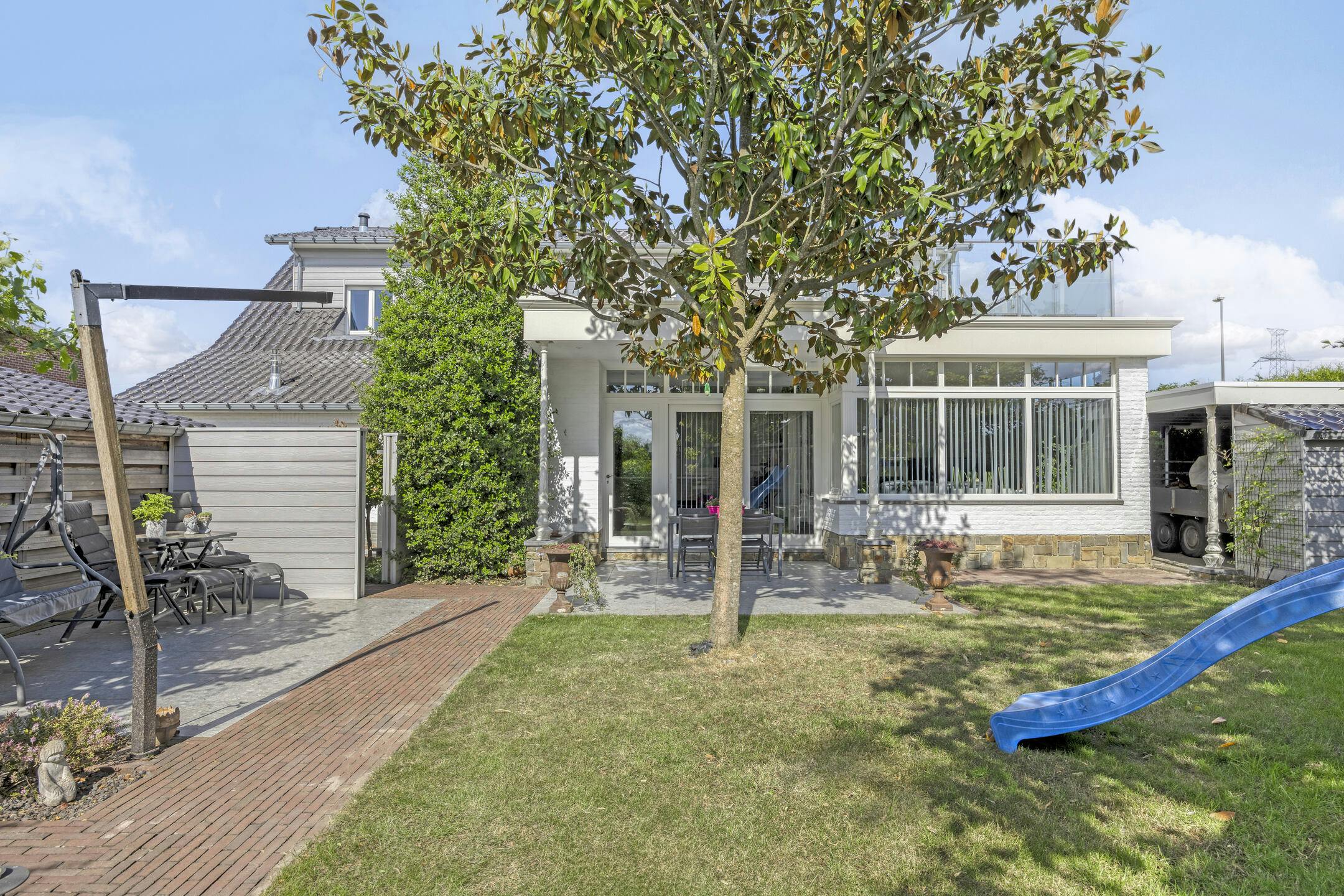 Riante zorgwoning/kangoeroewoning met loods te koop foto 36