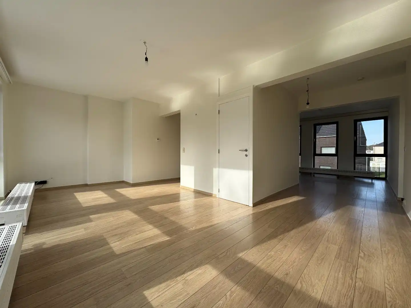 een 2-SLPK- hoekappartement met garage en berging foto 3