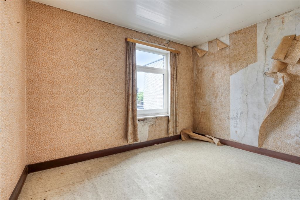 Halfopen woning met potentieel  foto 11