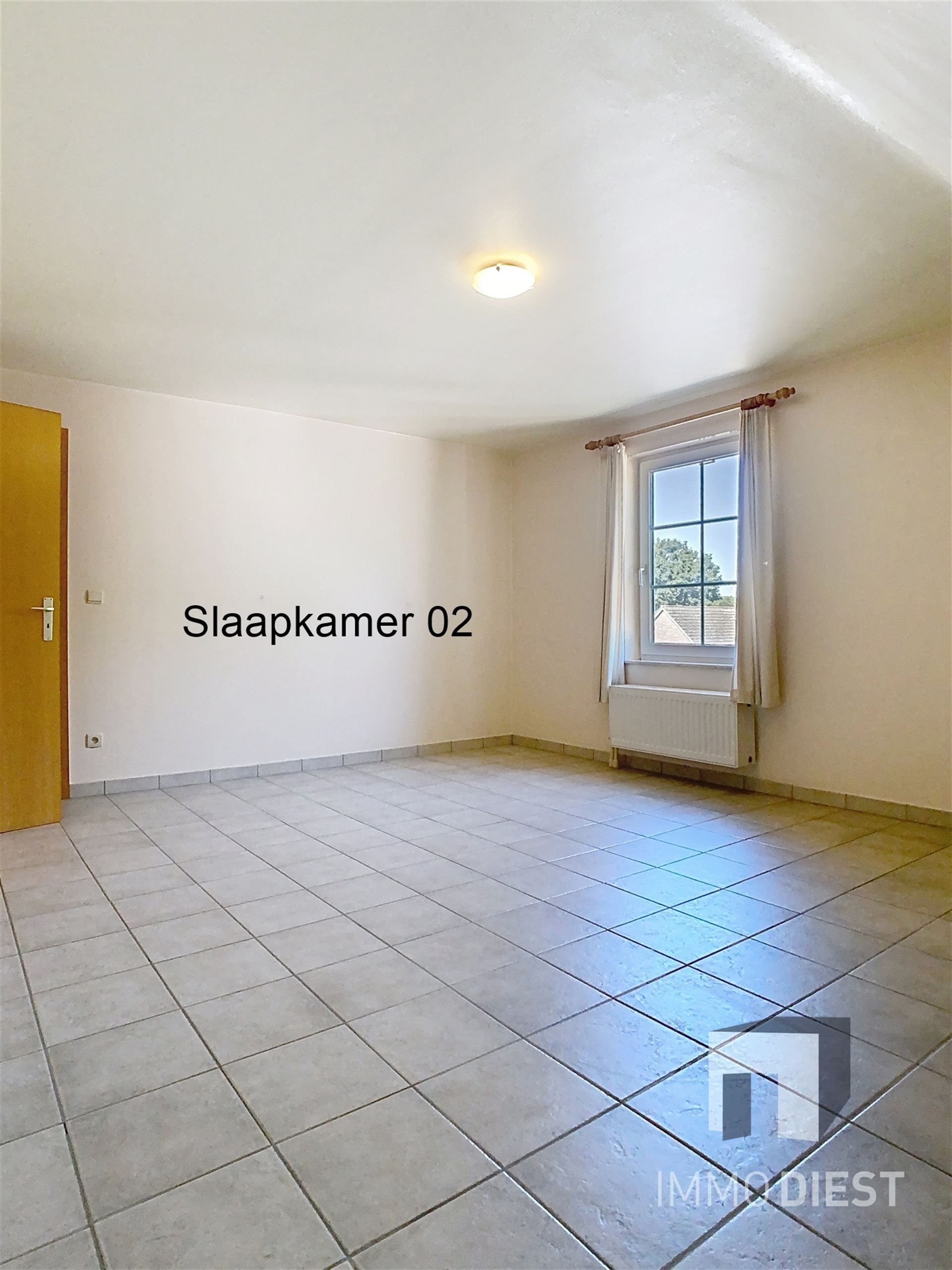 Triplex met 2 slaapkamers en inpandige garage foto 15