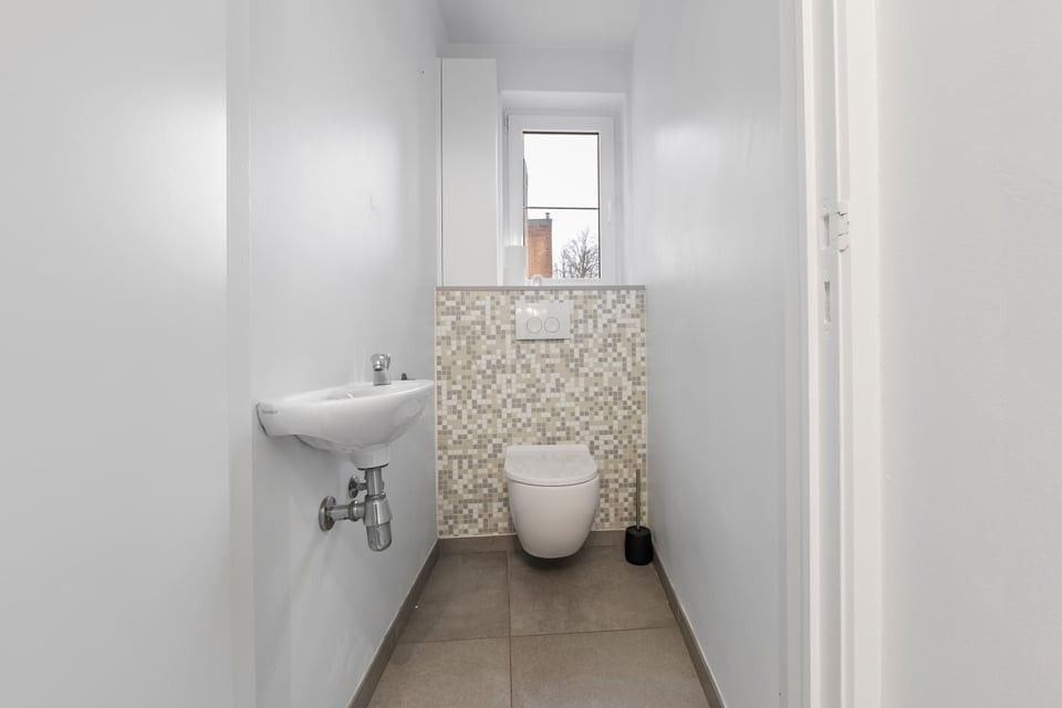 Charmant handelshuis op toplocatie in het hart van de Tongerse winkelstraat foto 11