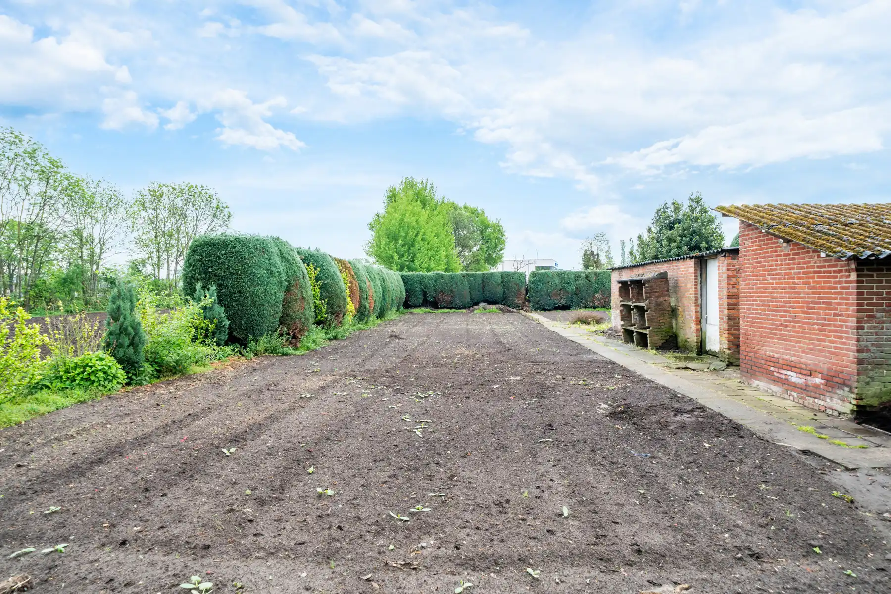 Karaktervolle jaren ’60 gezinswoning met een uitzonderlijk breed perceel (37m) en eindeloos potentieel op een toplocatie in Geel! foto 19