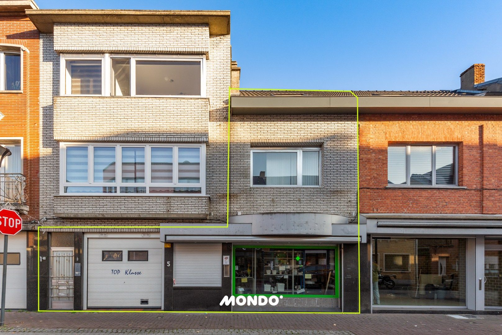 Veelzijdig handelspand met duplex in hartje Willebroek — uitstekende commerciële ligging. foto 1