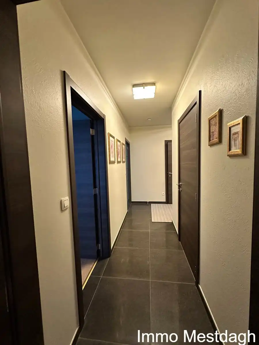 Ruim gelijkvloers appartement met tuin en autostaanplaats. foto 18