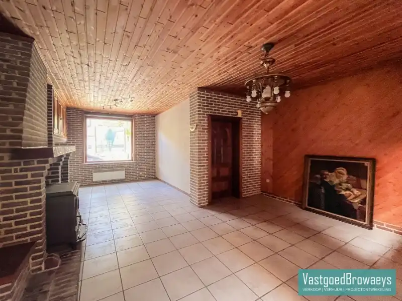 Te renoveren woning met zonrijke tuin nabij het station foto 4