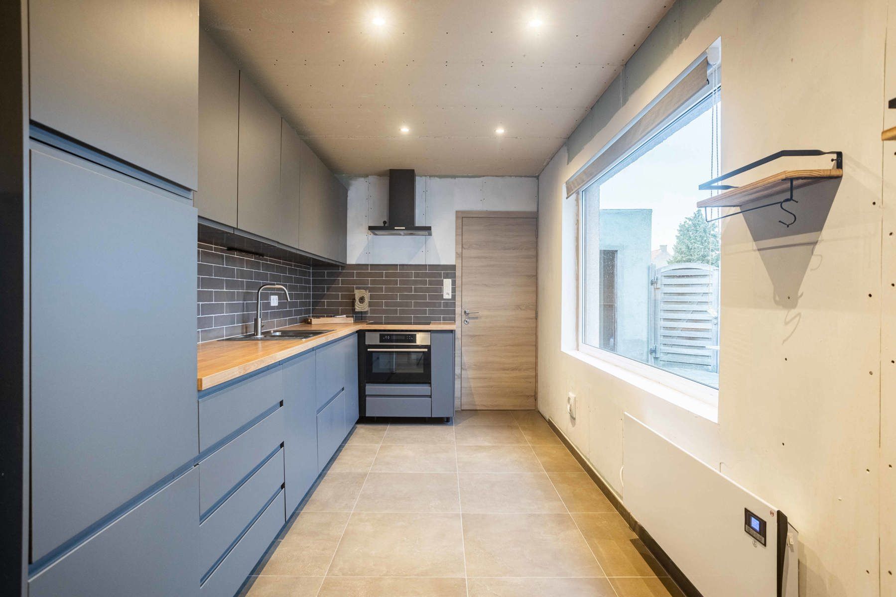 Goed gelegen halfopen bebouwing te Burst foto 4