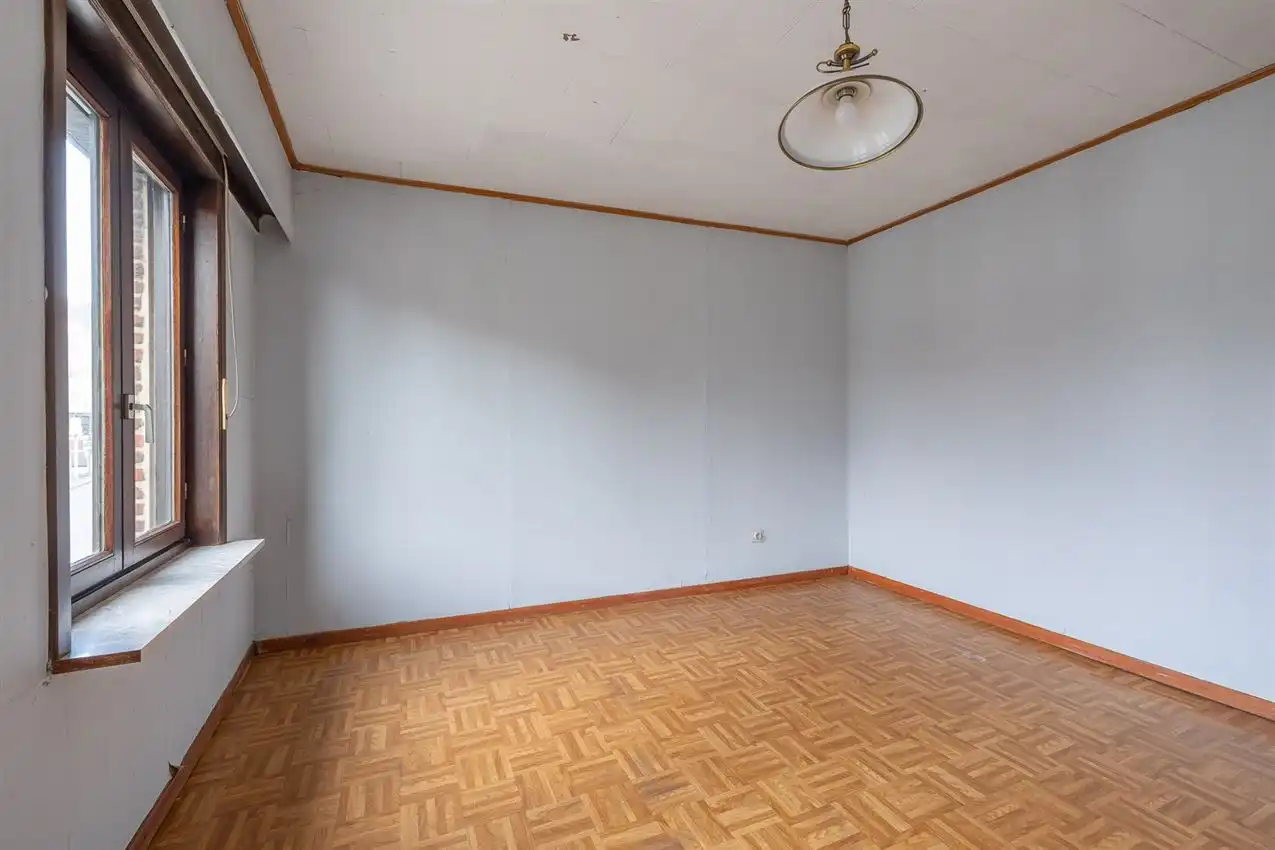 Op te frissen rijwoning in het centrum foto 12