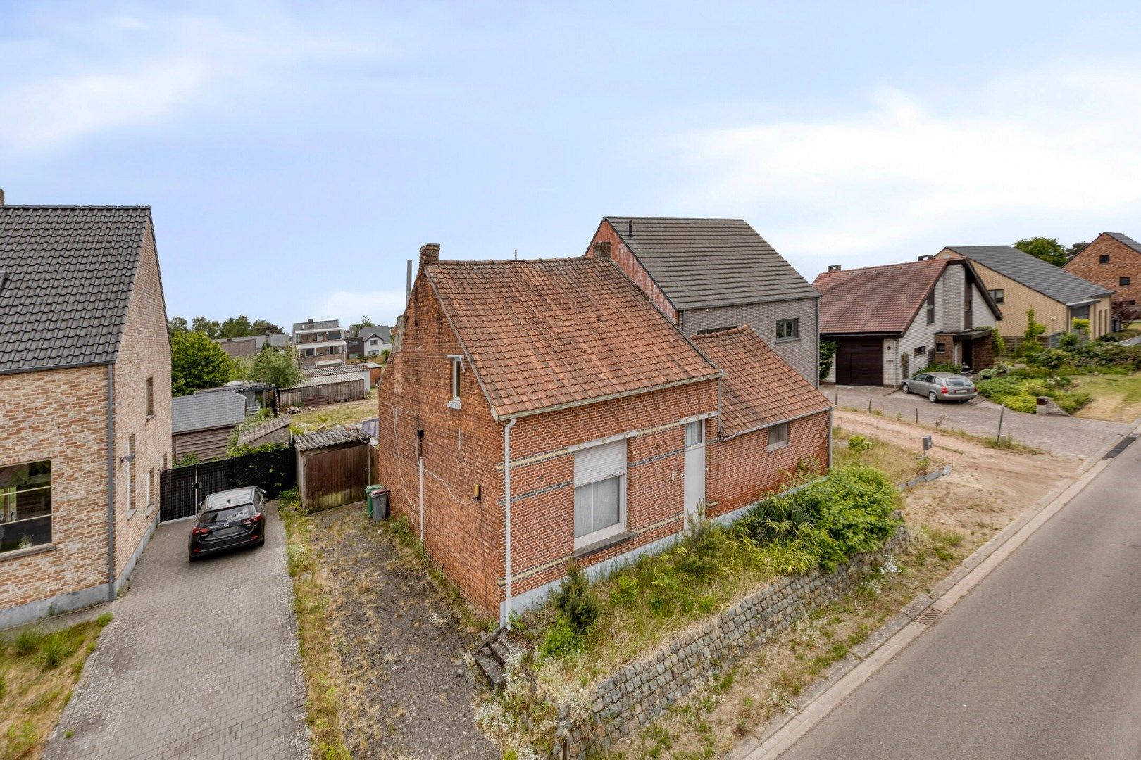 Bouwgrond van 674m² met af te  breken woning in een doodlopende straat te Ginderbuiten ! foto 11