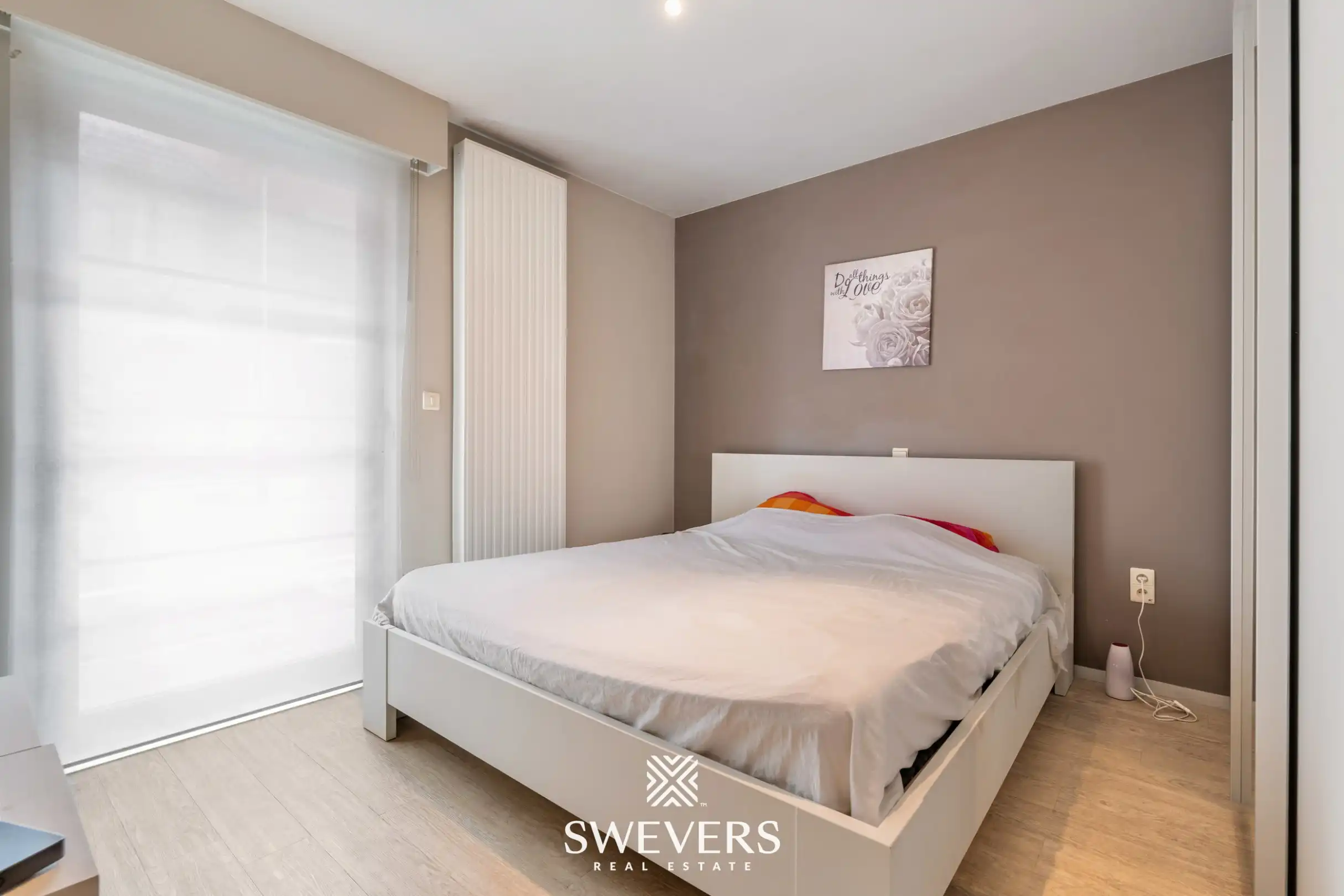 Uitstekend gelegen appartement met 2 slaapkamers, private tuin en ondergrondse staanplaats foto 5