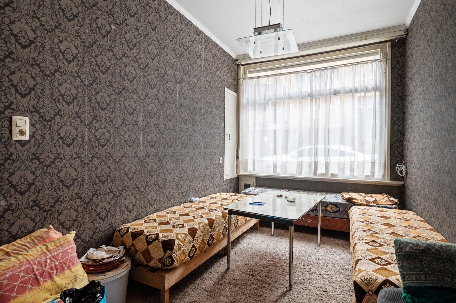 Opbrengsteigendom met een groot magazijn en 3 appartementen te koop! foto 8