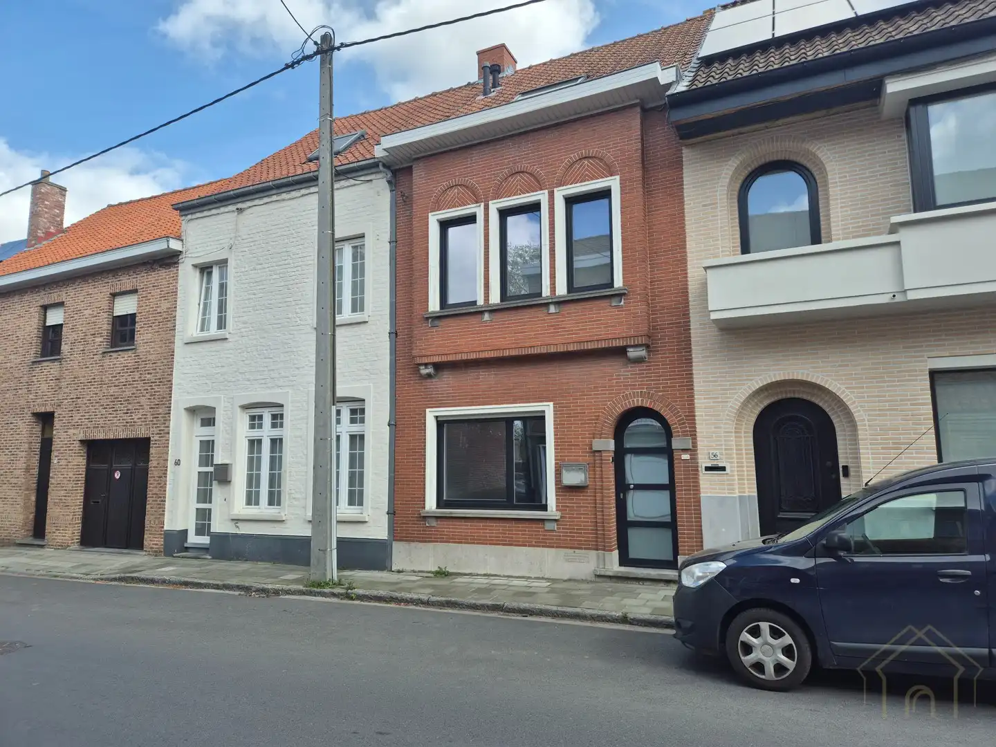 Comfortabele gezinswoning met twee slaapkamers en tuin foto {{pictureIndex}}