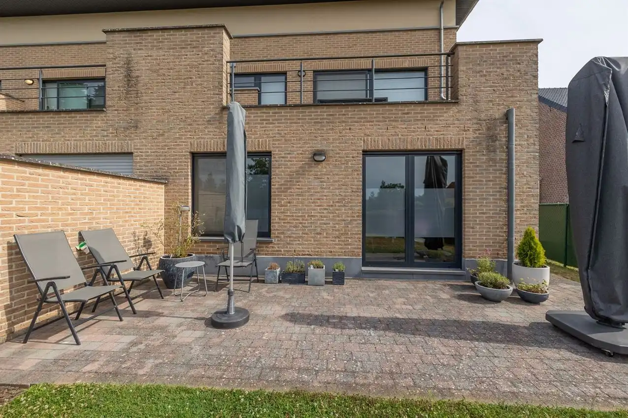 Ruim gelijkvloers wonen met tuin én rendement. foto 4