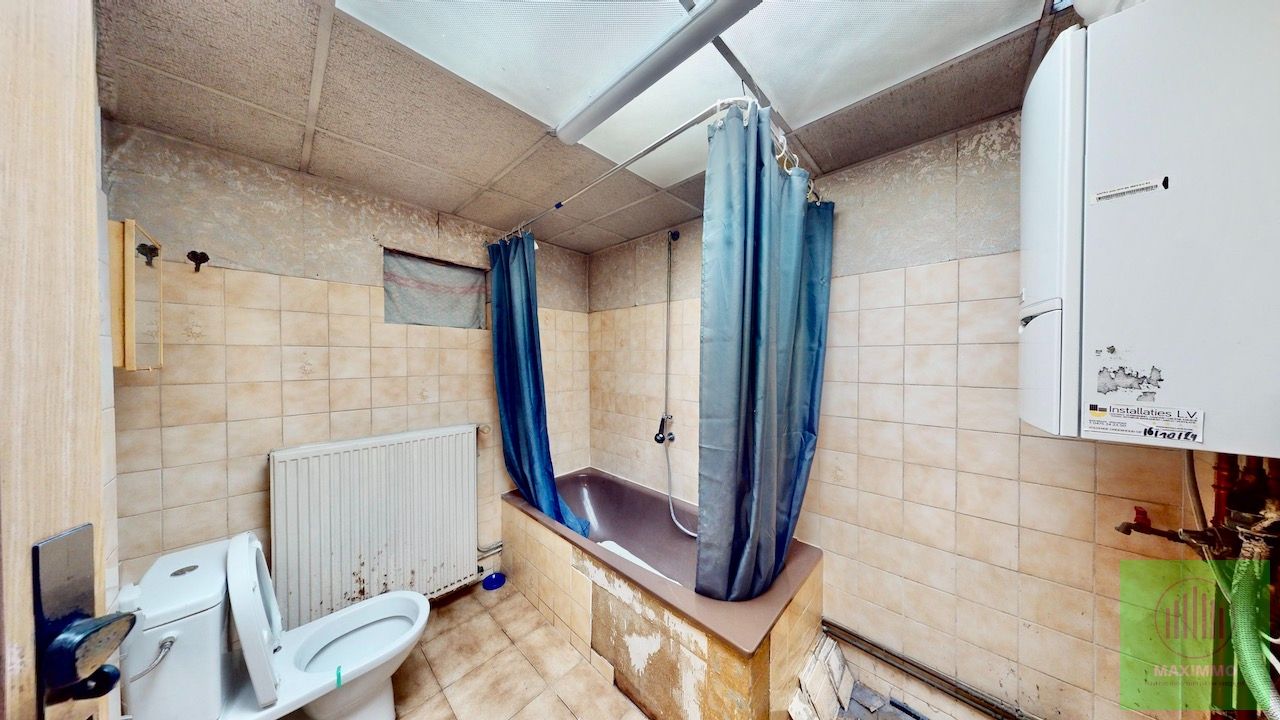 Te koop – Renovatieproject met potentieel in Menen foto 6