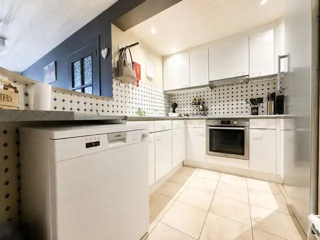 Gelijkvloers appartement met tuin en uitweg foto 3