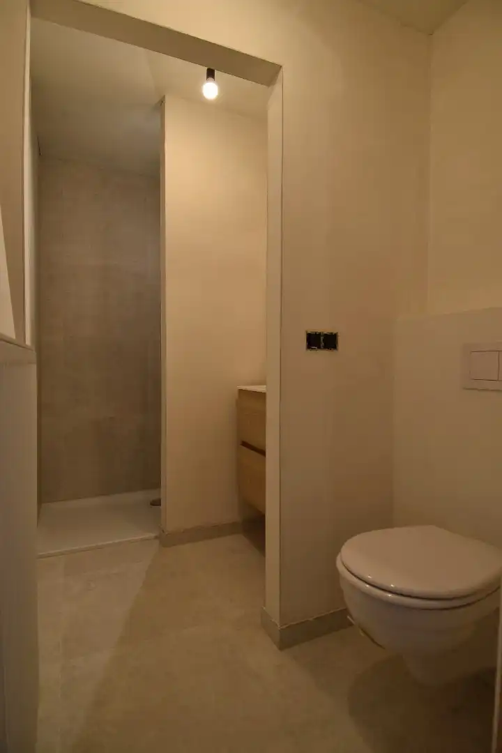 Gelijkvloers appartement te koop met 1 slaapkamer en tuinje in Helkijn foto 8