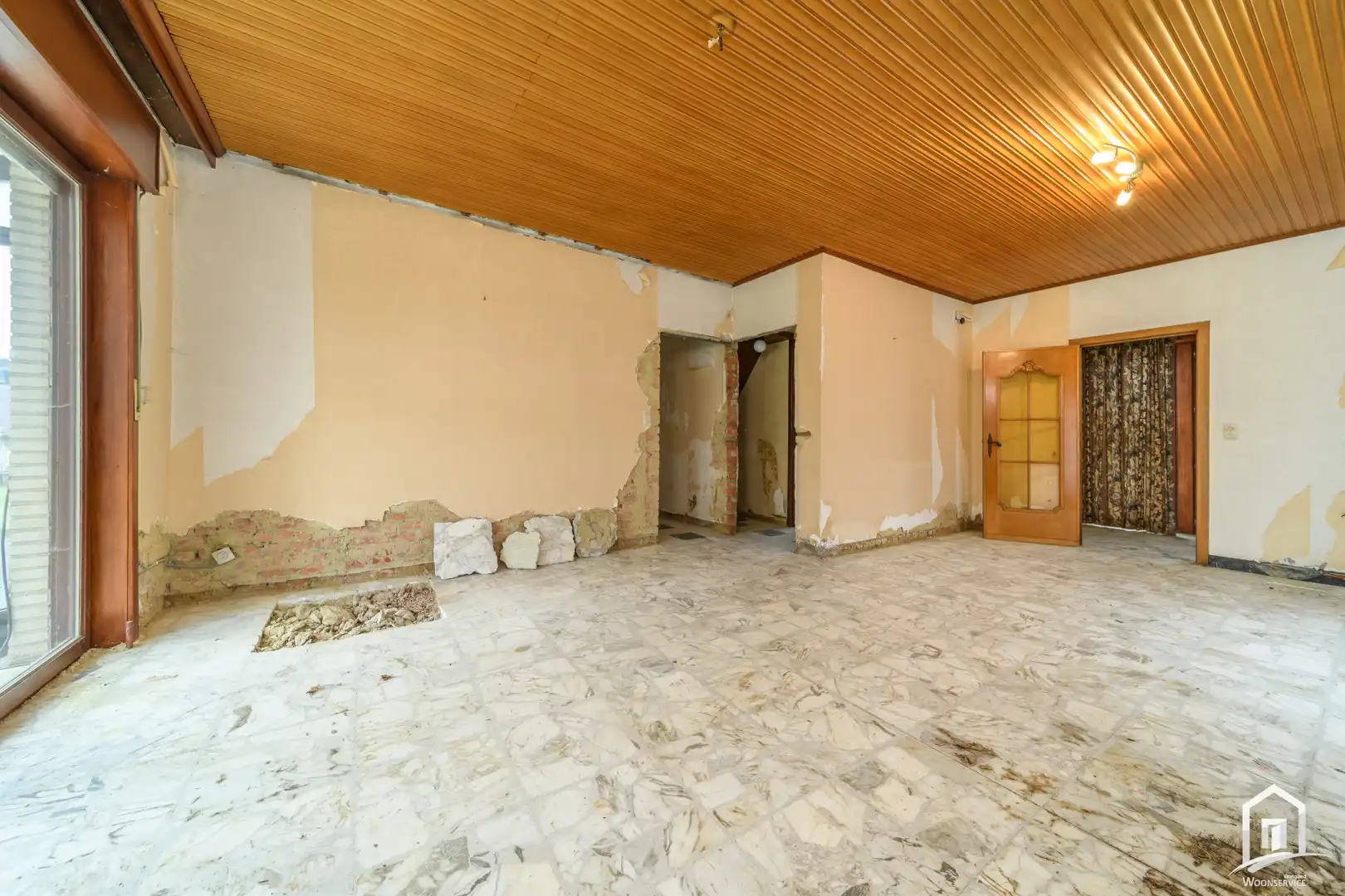 bungalow met achterliggende bouwgrond in het groene Hofstade foto 4