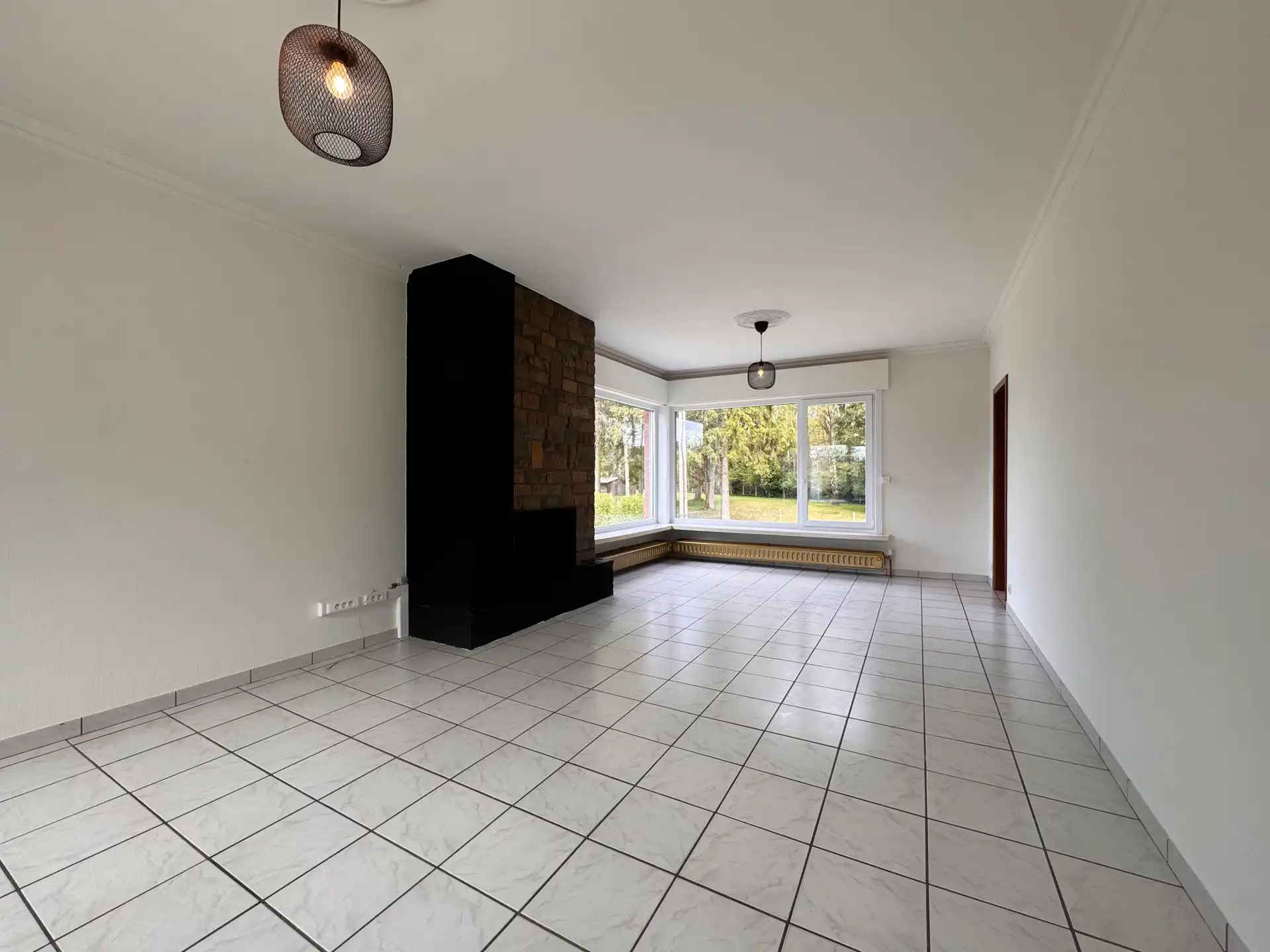 Rustig gelegen woning met 3 slaapkamers en grote tuin foto 2