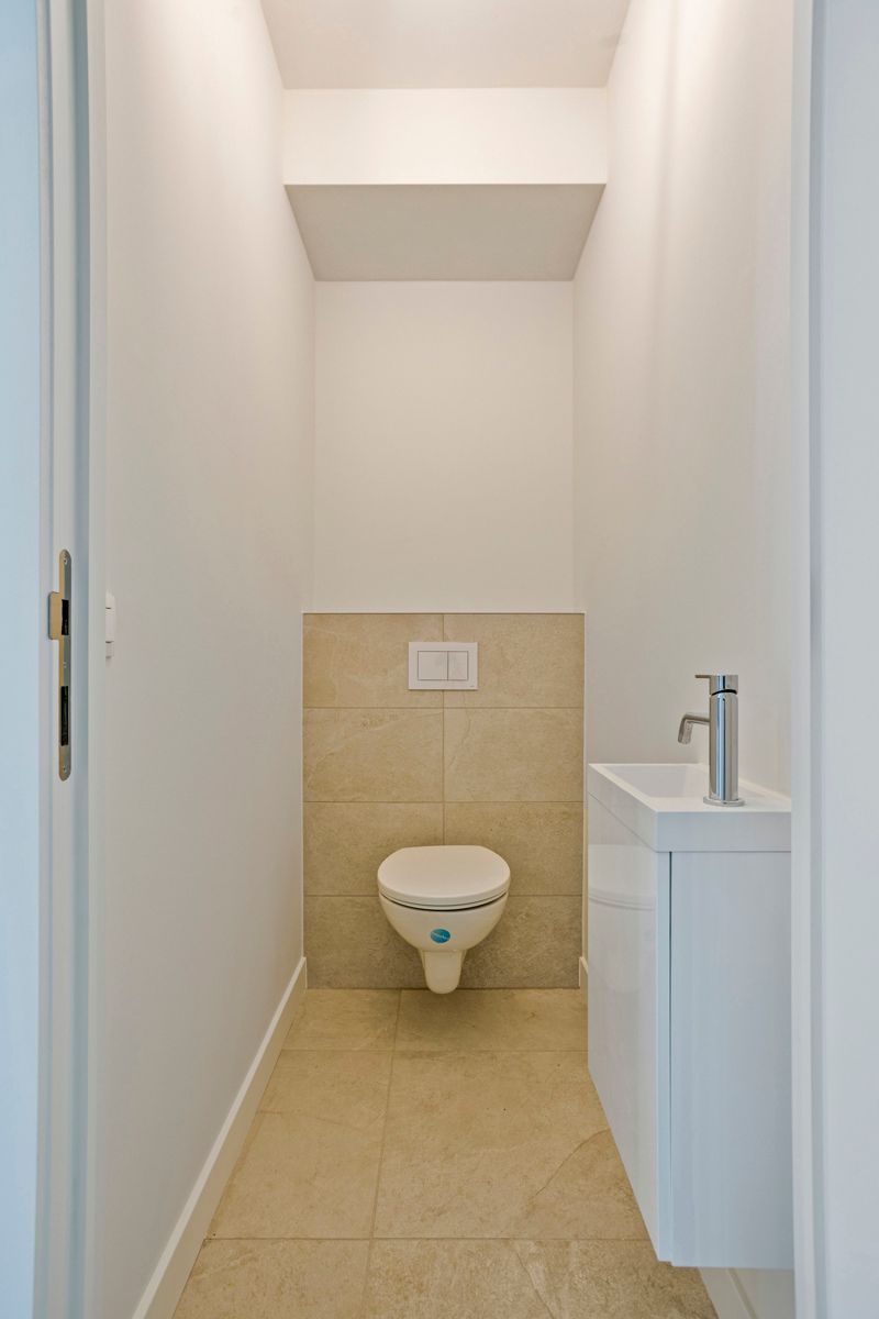 Uniek gelijkvloersapp. met veel lichtinval en private tuin! foto 5