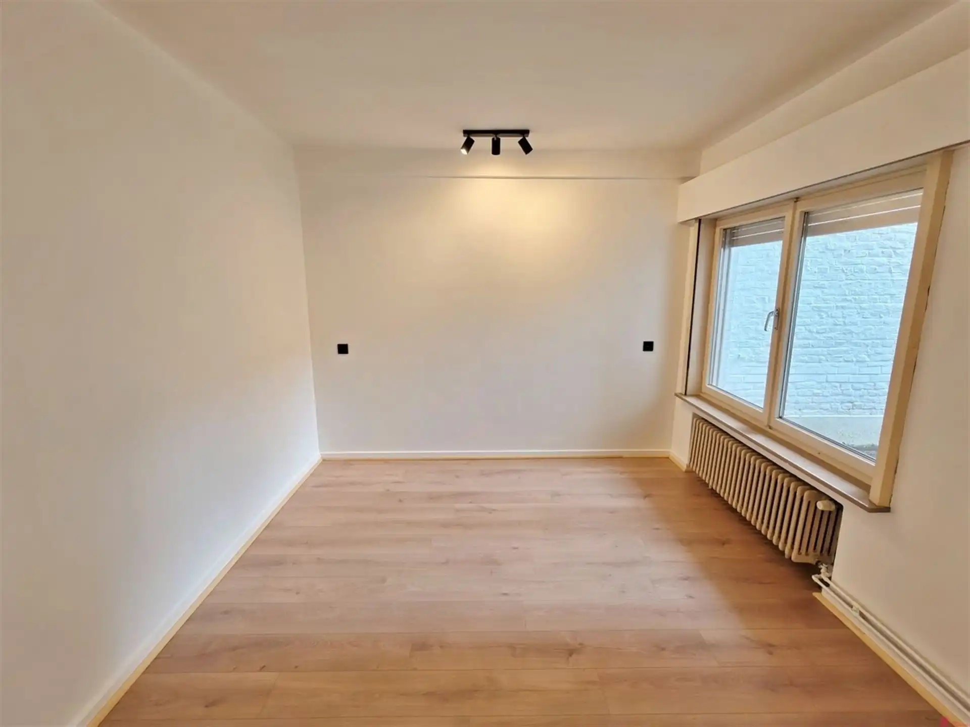 Instapklaar gelijkvloers appartement in hartje Kortrijk foto 10