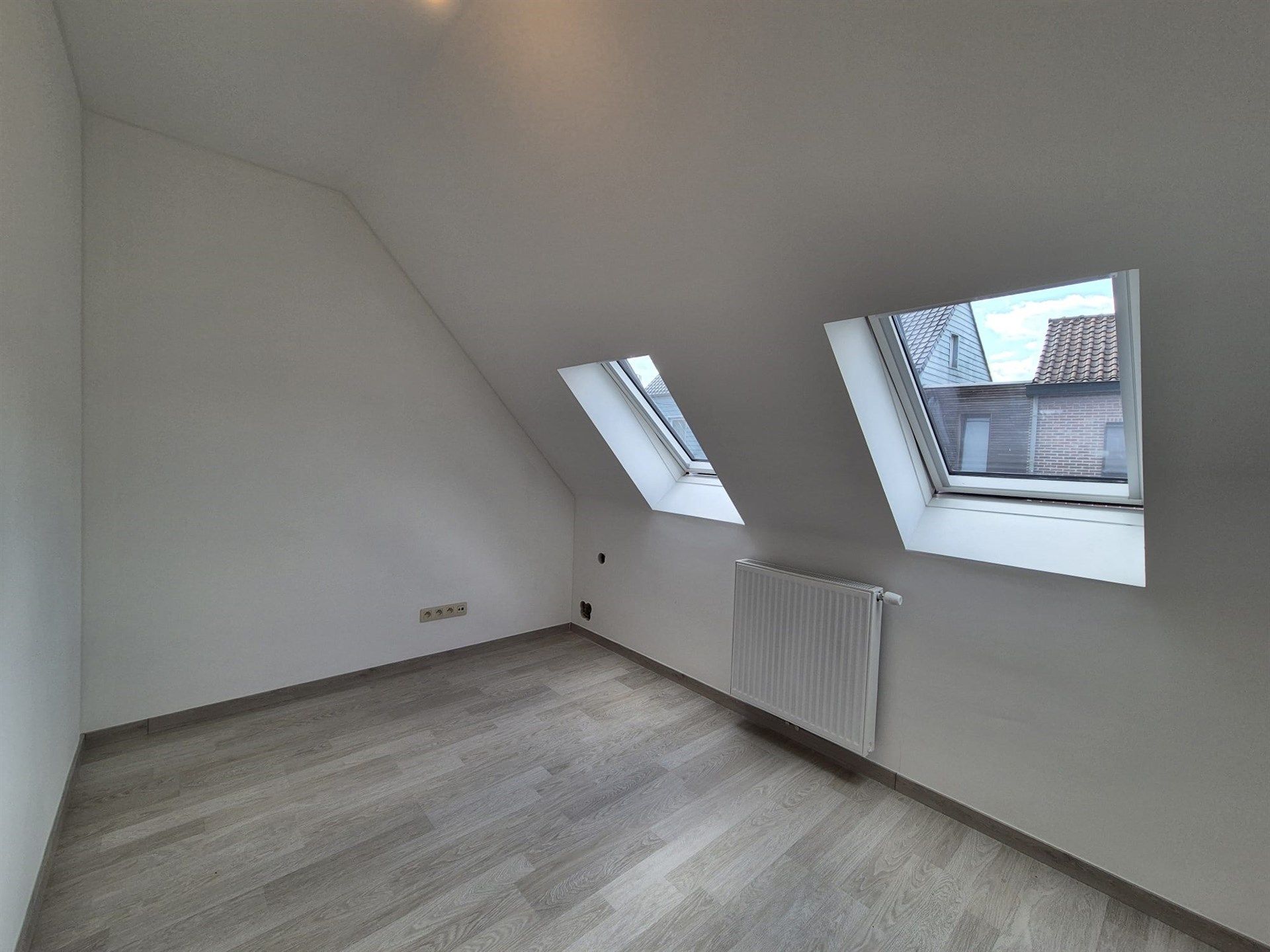 Zeer energiezuinige woning met 2 slaapkamers en tuin. foto 22