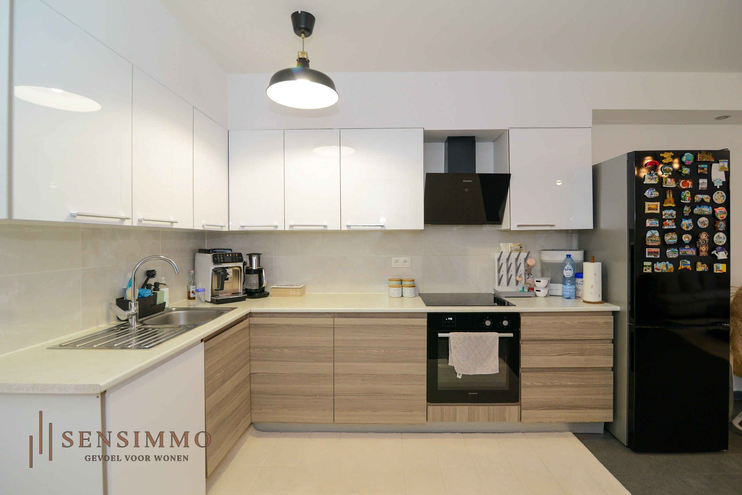 Gelijkvloers tweeslaapkamerappartement met tuin, parking en kelderberging foto 9