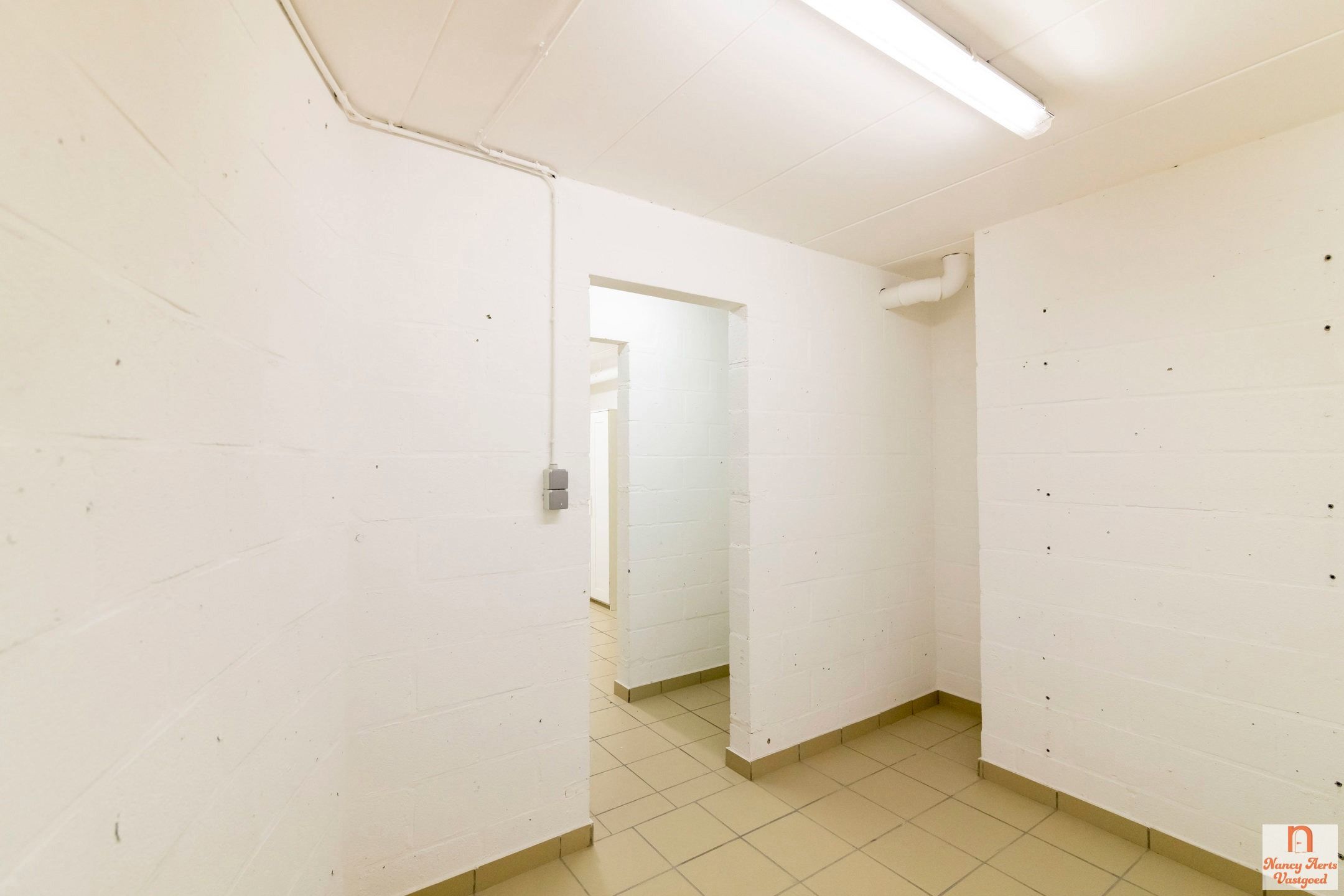 Lichtrijk duplexappartement met grote kelder en mega terras foto 28