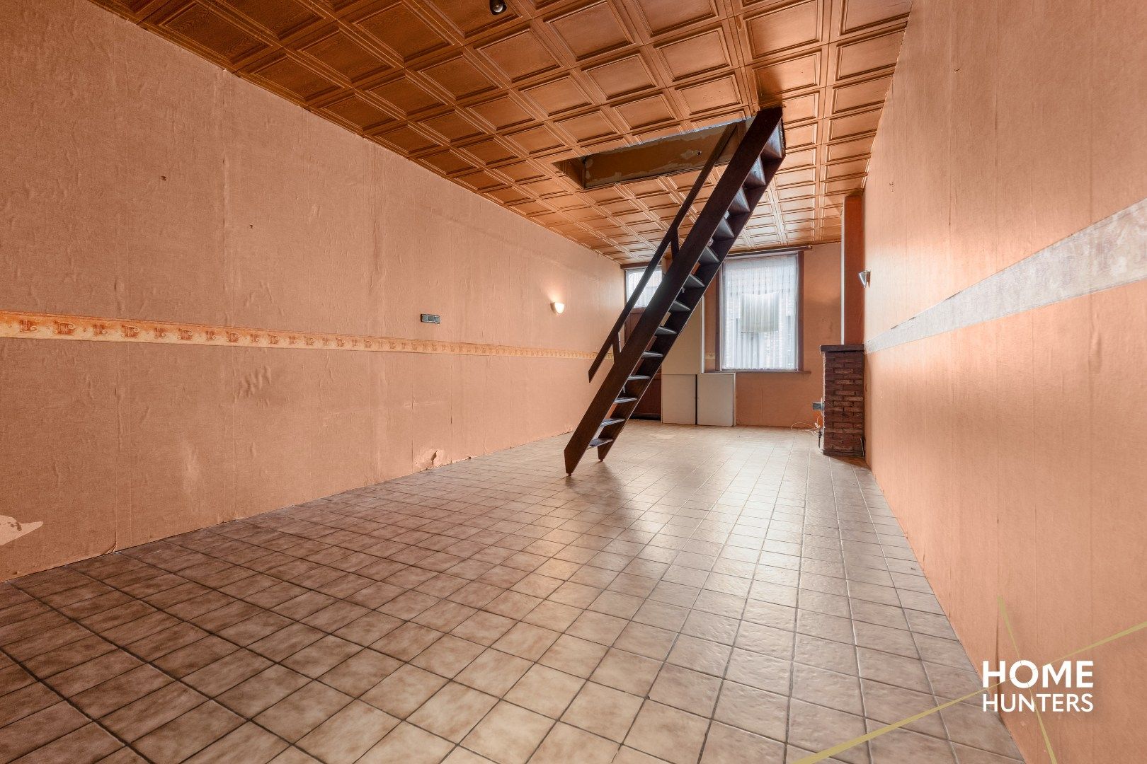 Charmante te renoveren rijwoning met 3 slaapkamers en diepe tuin op centrale ligging in Menen foto 8