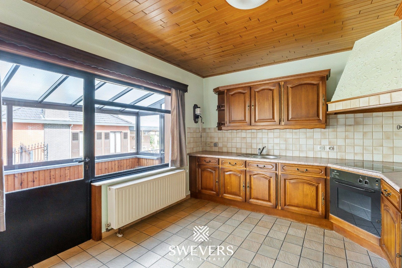 Ruime gezinswoning met renovatiepotentieel in Borgloon foto 12